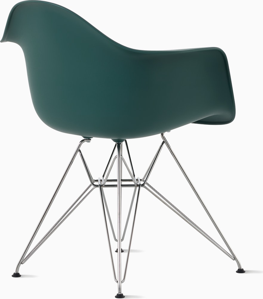 Back angle of evergreen plastic shell chair with wire base legs.