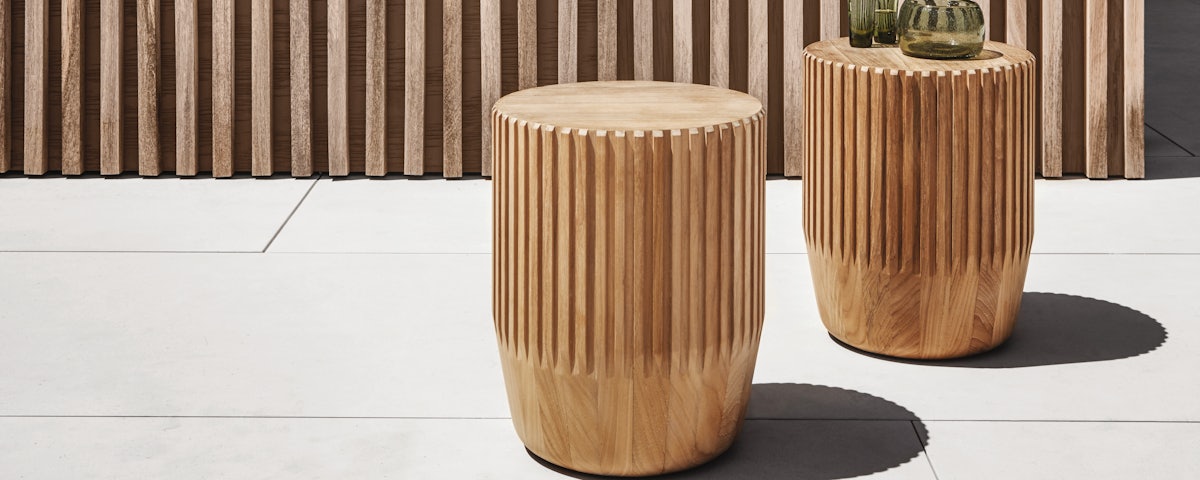 Two Arbor Outdoor Side Tables in an outdoor patio setting