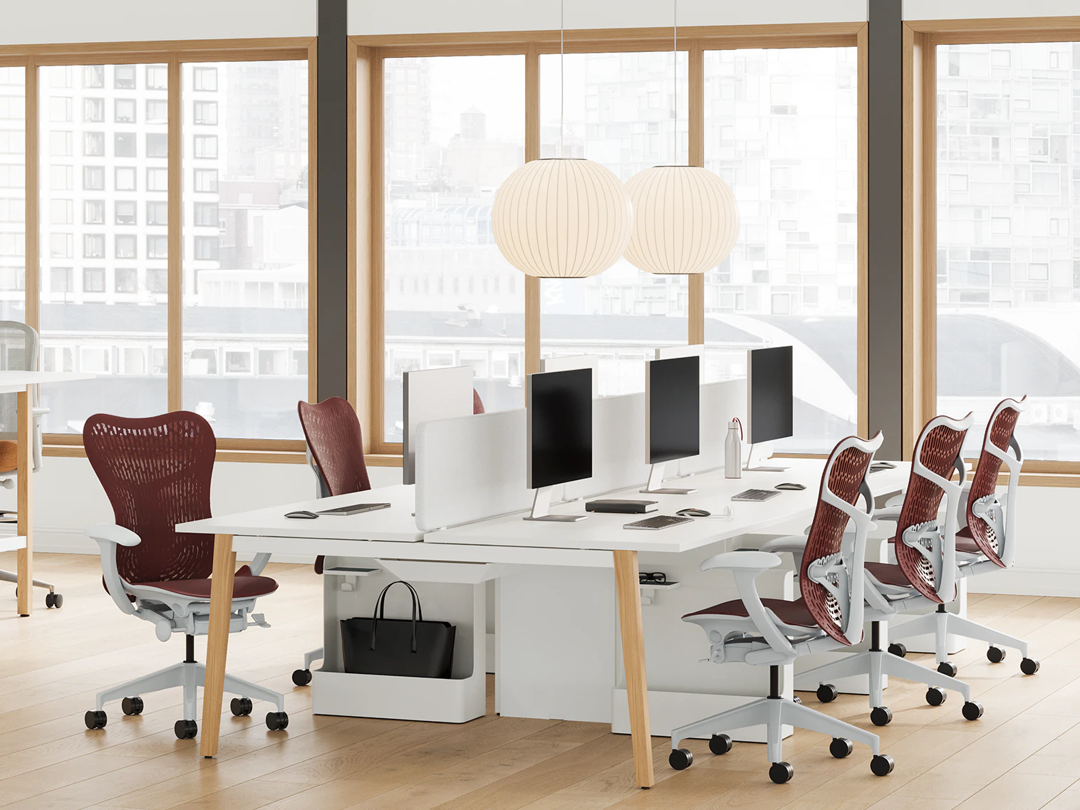 Office space with Layout Studio fixed-height workstations with Aero-Timber leg and Mirra 2 chairs.