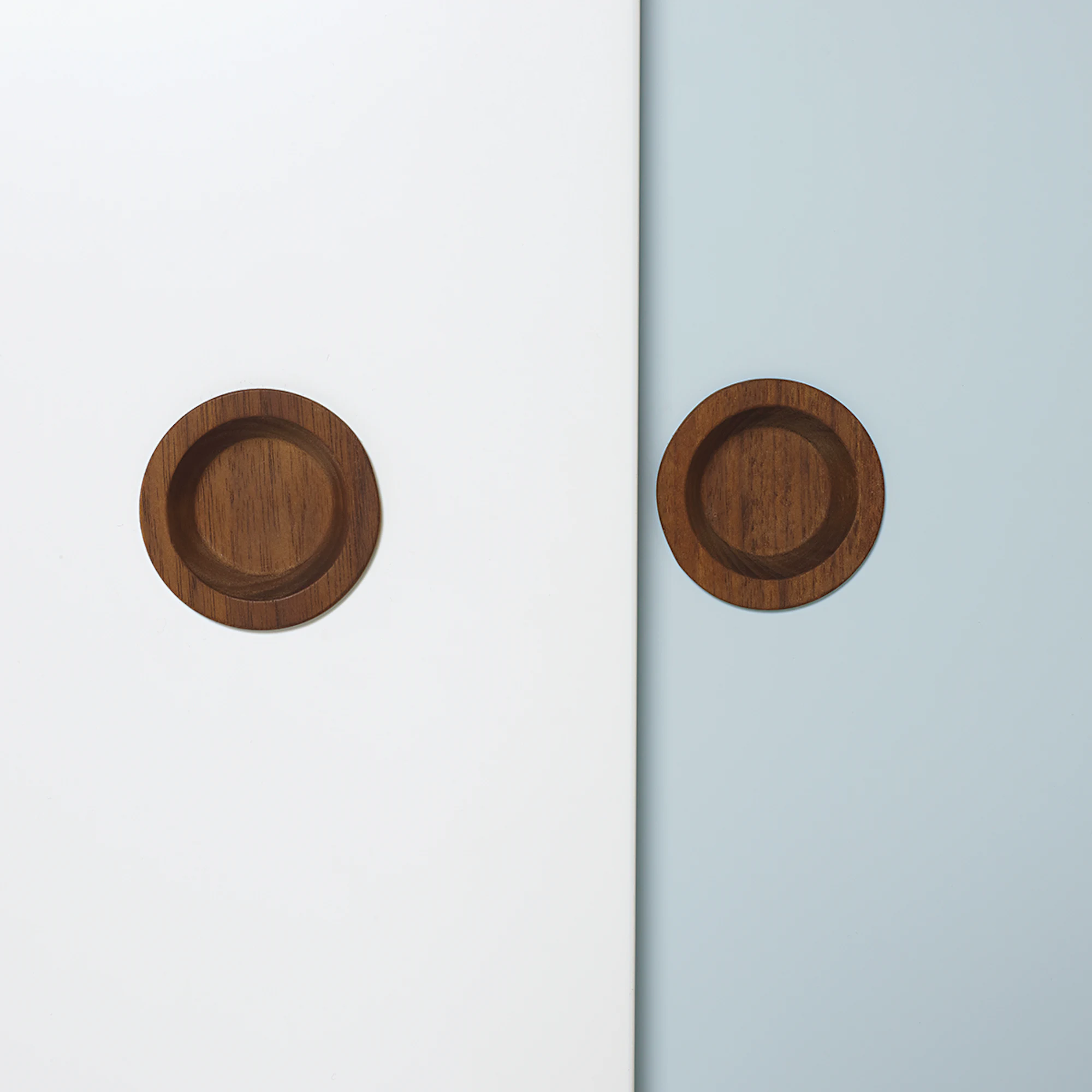 Round walnut pull on credenza door