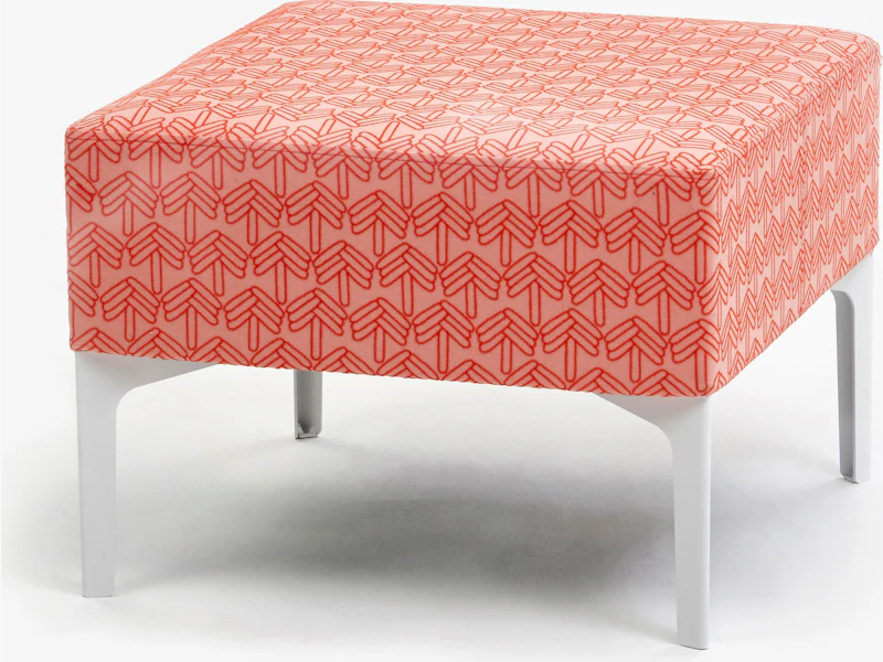 A front angle view of the Symbol Single Stool in a coral pattern.