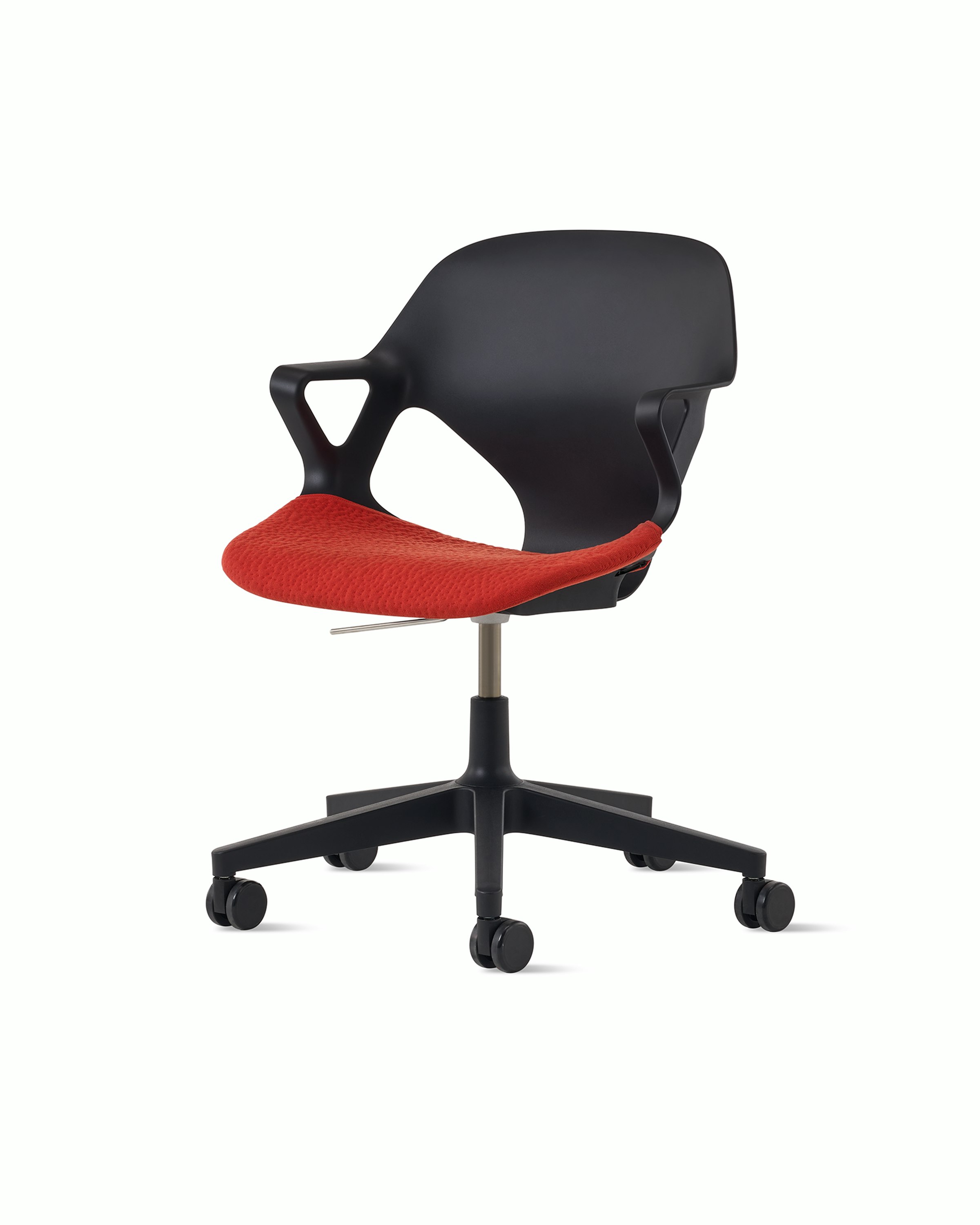 Front angle view of a black Zeph chair with fixed arms and a bright red seat pad.