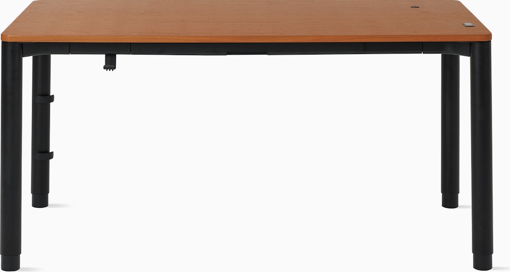 Four leg height-adjustable table shown at an angle with a dark woodgrain surface and black base.