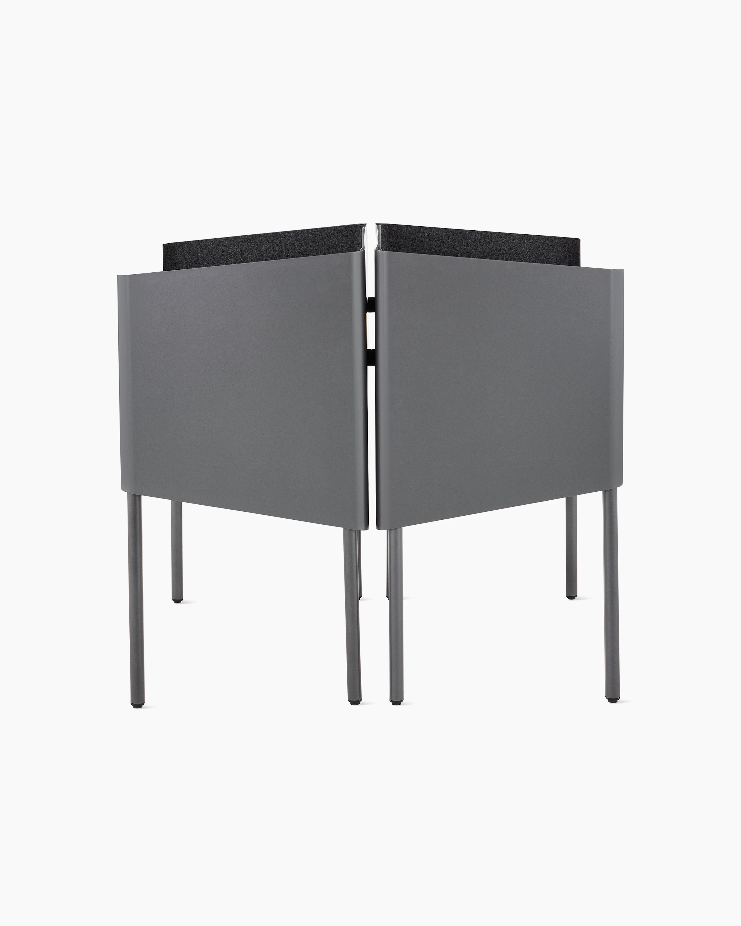 Two grey OE1 Nooks, back-to-back, viewed from the side.