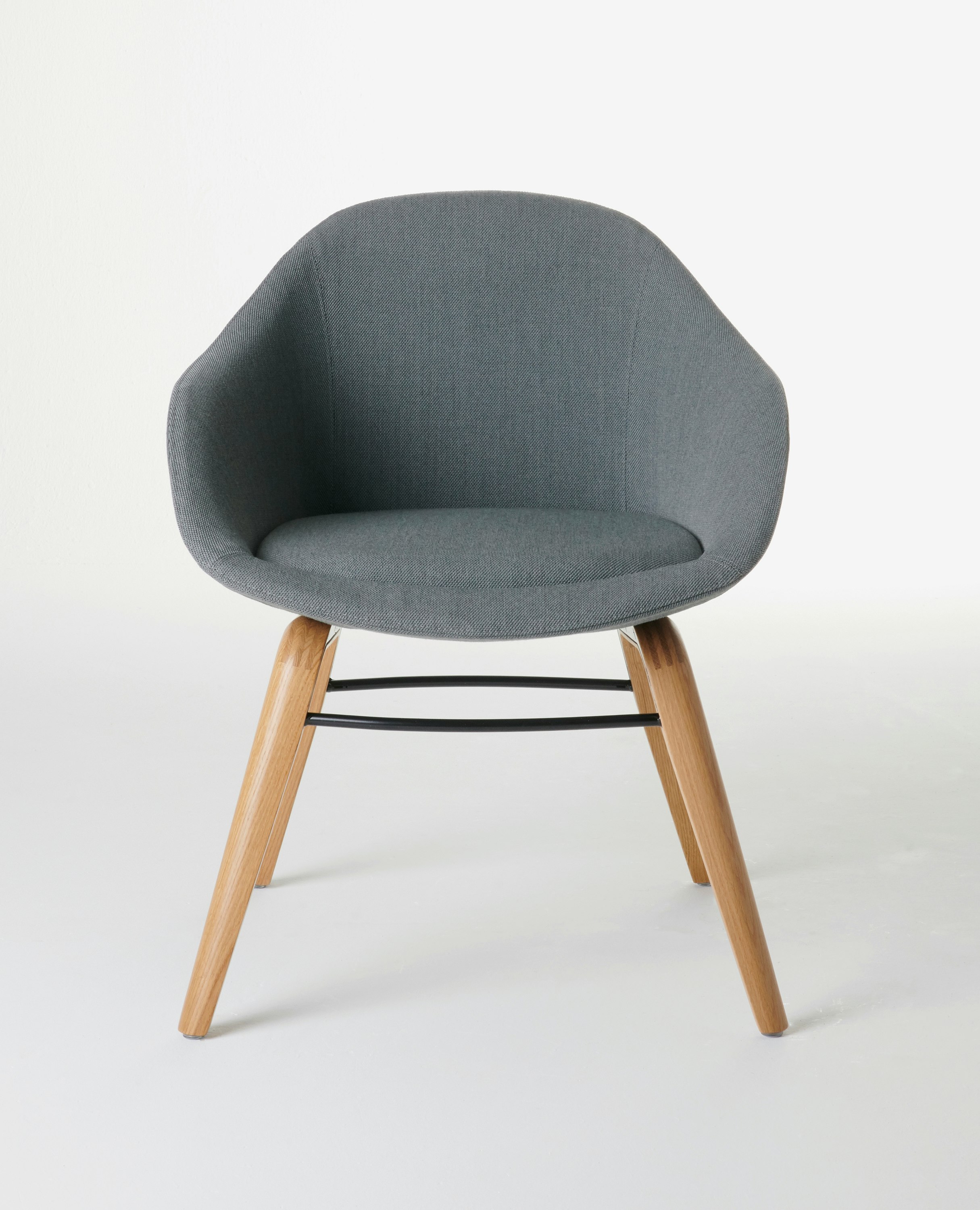 White sweep shot of dark grey Always Side Chair with solid oak base.