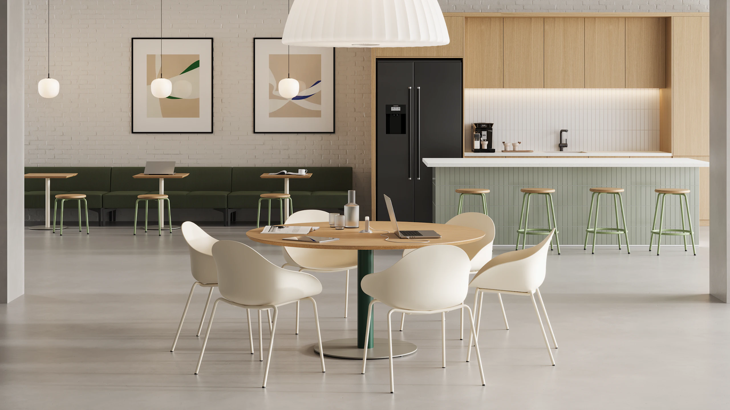 Open plan office with large Tier table with power surrounded by Ruby Chairs.