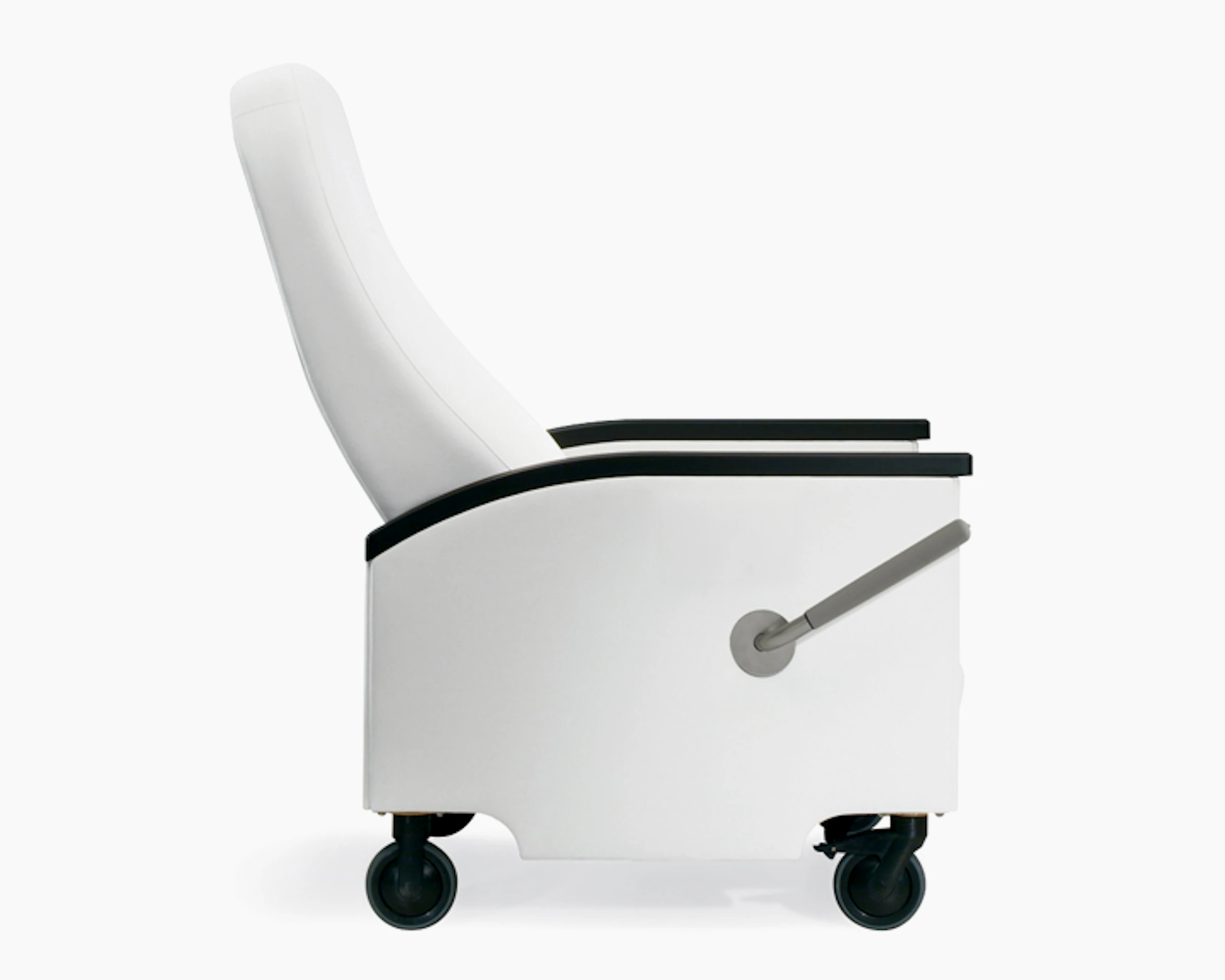 A side view of a Prísto Plus Recliner in a white upholstery with black urethane arm caps in a slightly reclined position.