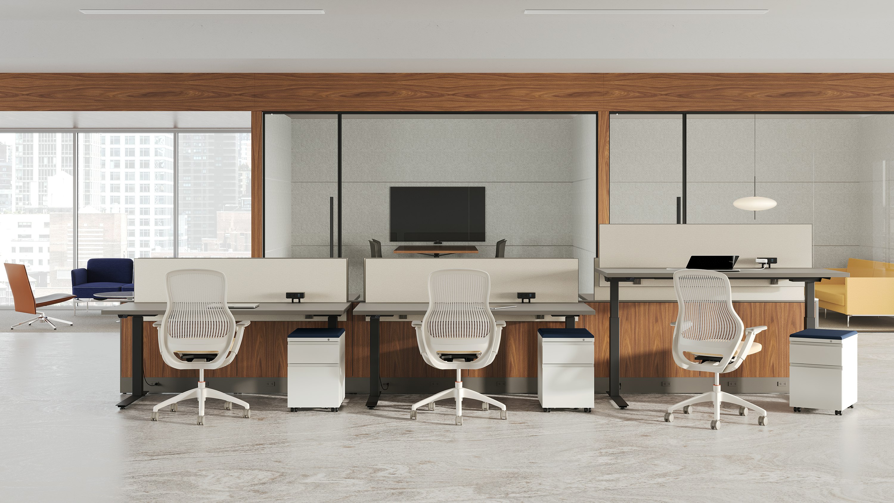 Open office setting with black k. stand height-adjustable tables, white ReGeneration chairs and white Series 2 mobile pedestals.