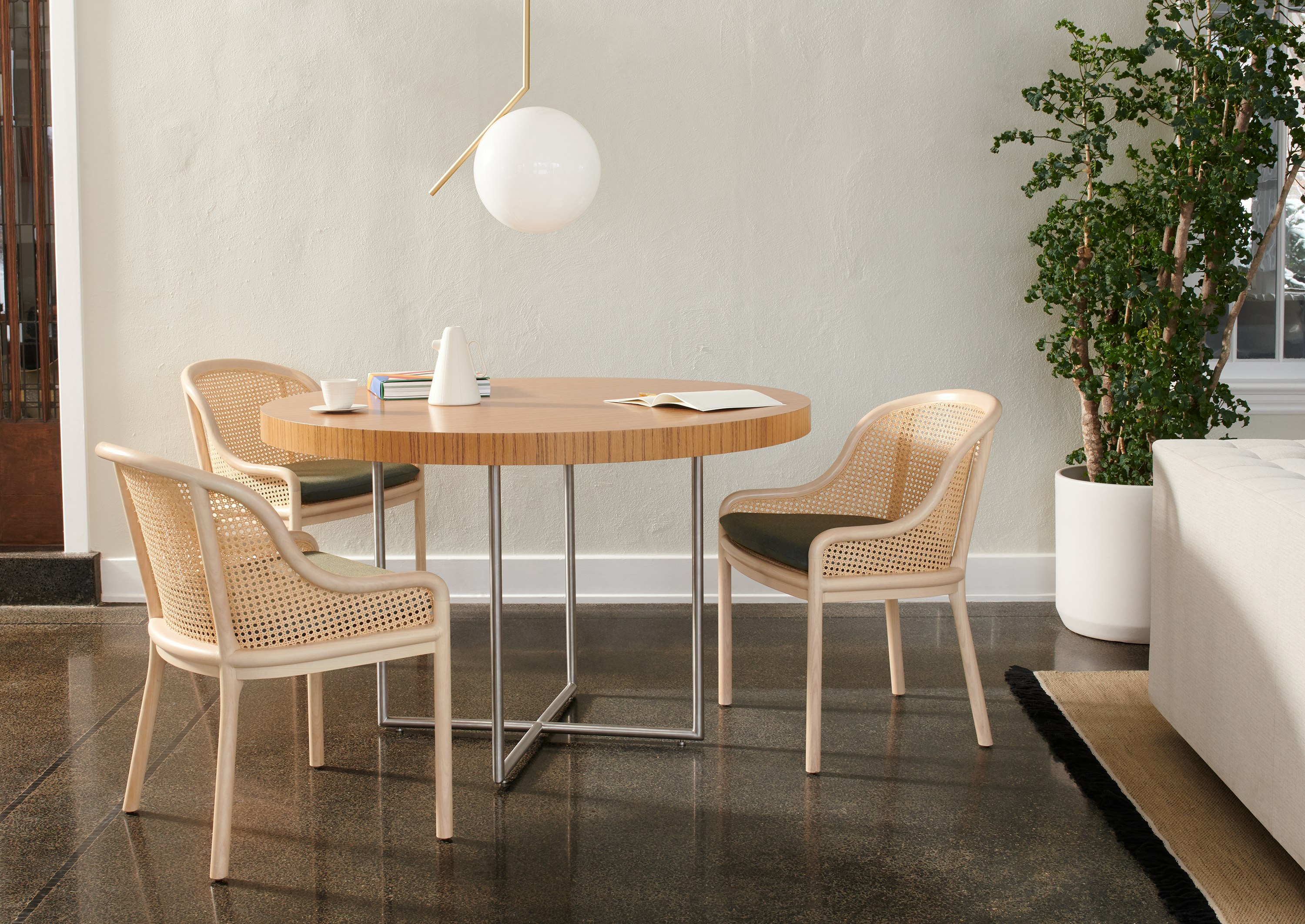 A common area featuring a Domino Table and Landmark Chairs.