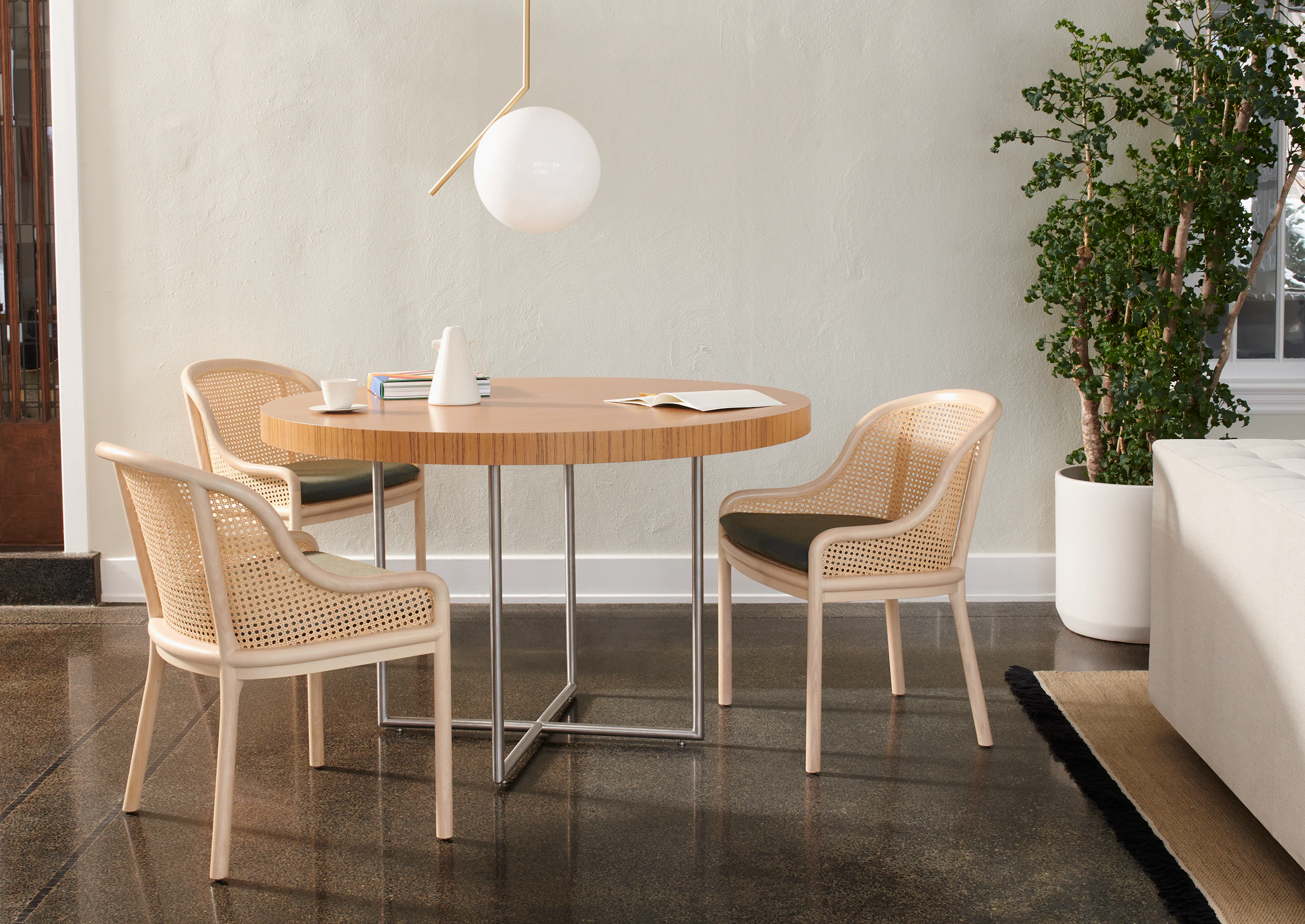 A common area featuring a Domino Table and Landmark Chairs.