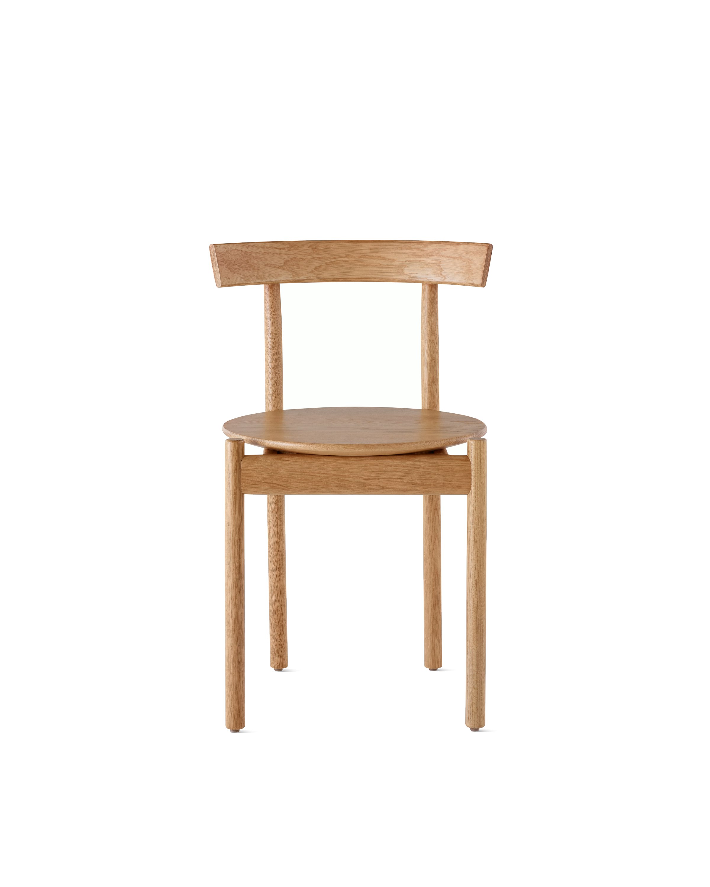 An oak Comma Chair, viewed from the front.