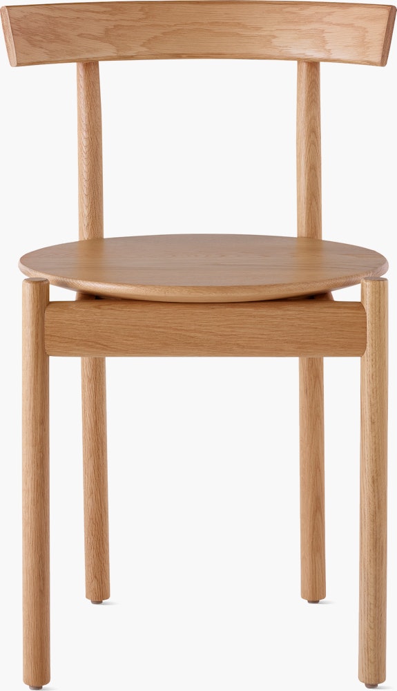 An oak Comma Chair, viewed from the front.