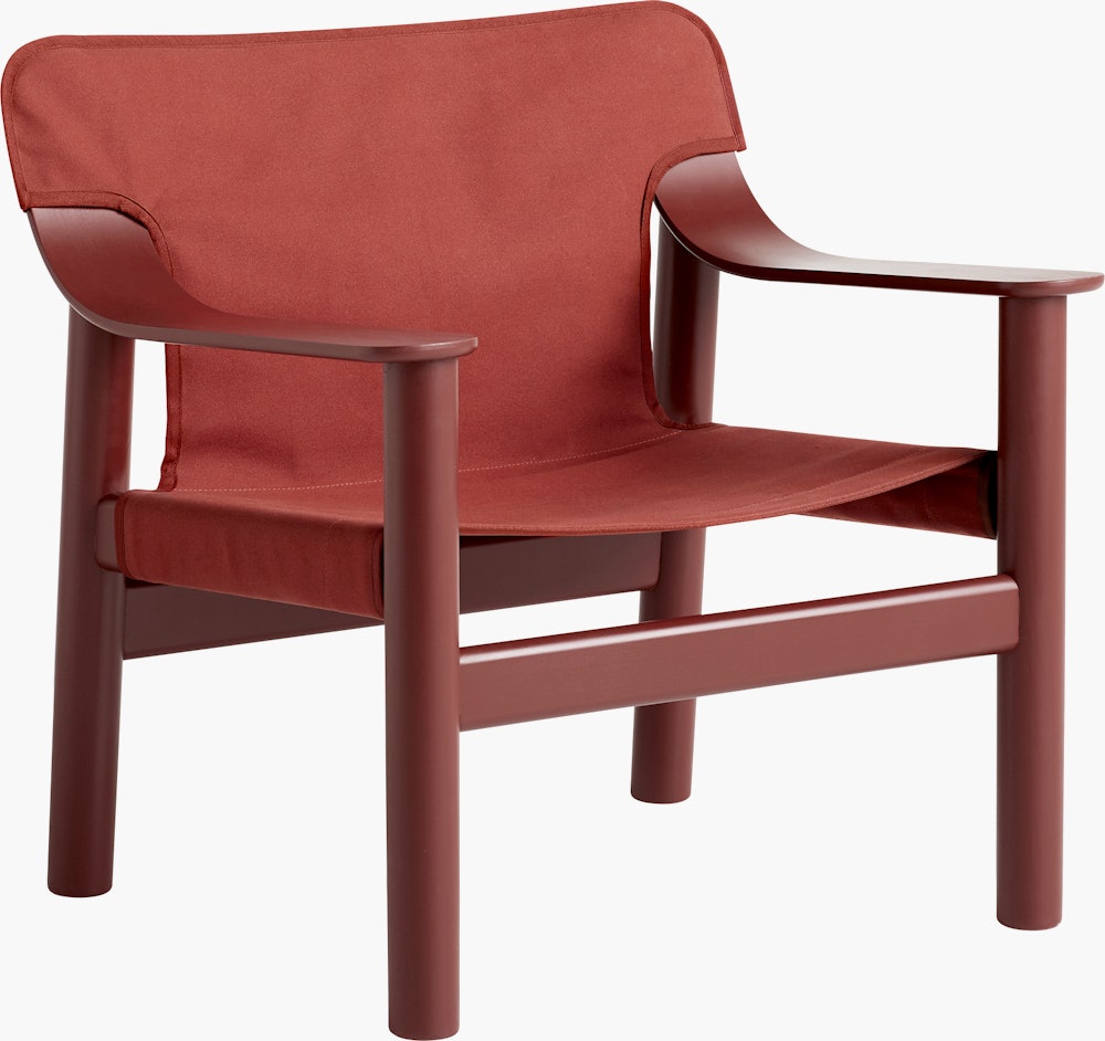 A front angle view of the Bernard Lounge Chair with a red frame, seat and back.