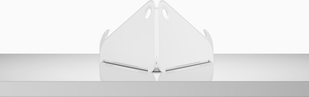 A back view of an open Oripura Laptop Stand on top of a worksurface.