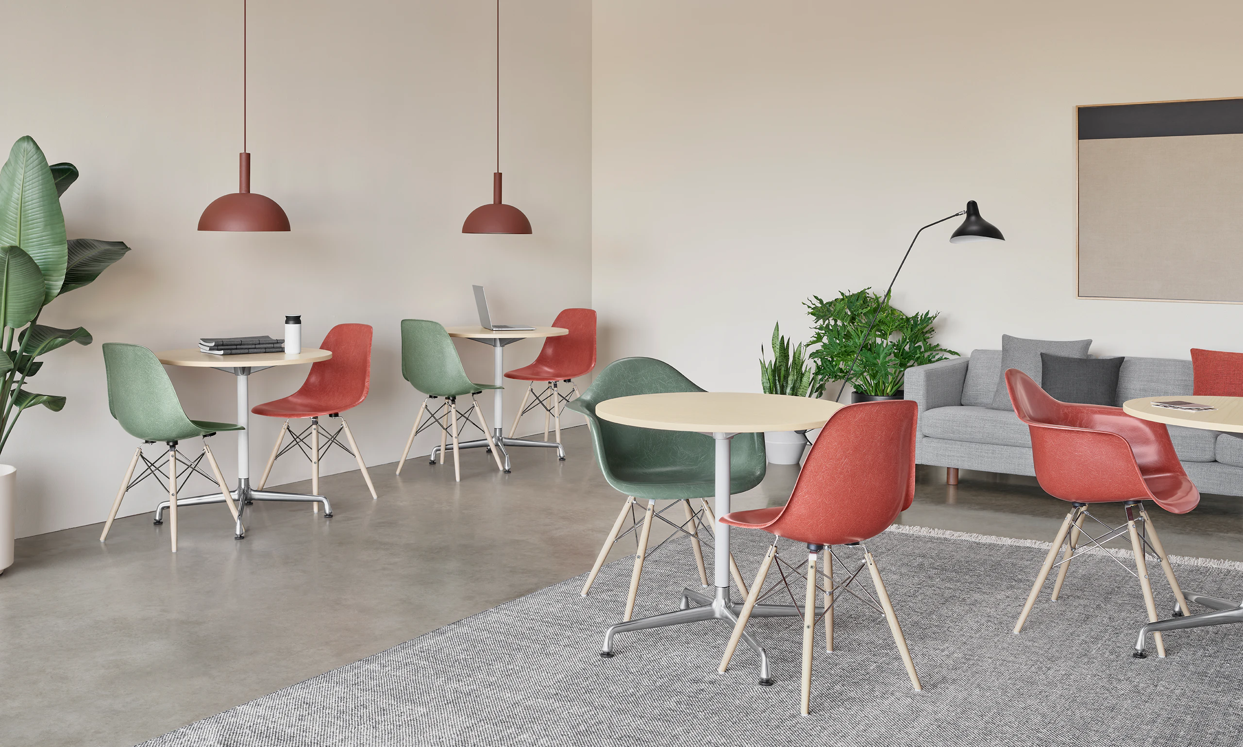 Terra Cotta and Dark Seafoam Fiberglass Chairs with Eames 30" Conference Table, viewed from front.