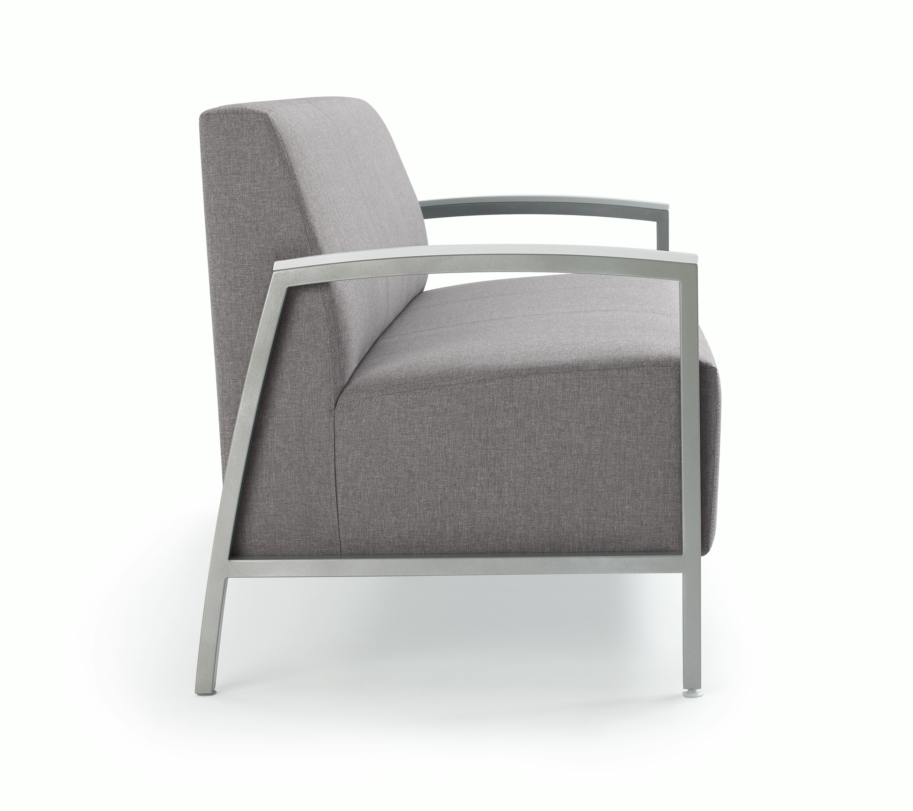 Side view of Brava Modern Lounge Seating (sofa) with solid surface arm caps.