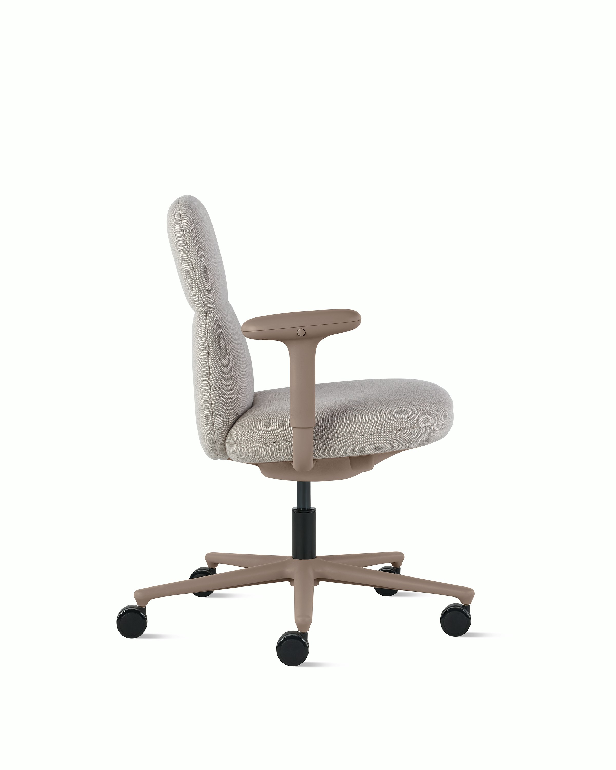 Side view of a mid-back Asari chair by Herman Miller in light brown with height adjustable arms.