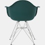 Back of evergreen plastic shell chair with wire base legs.