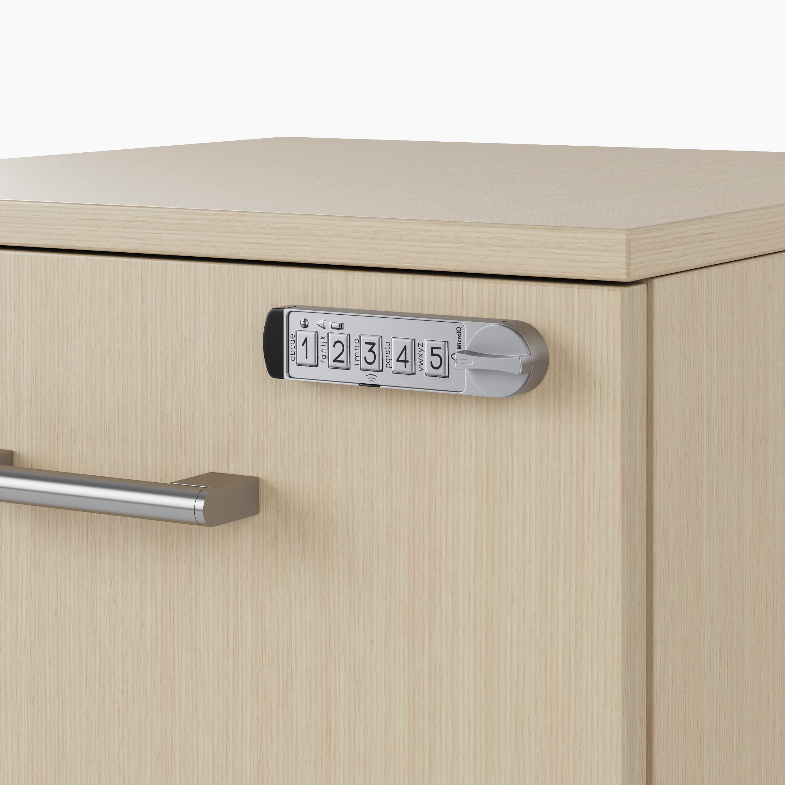 A detail of the keyless lock on a clear on ash laminate cabinet drawer.