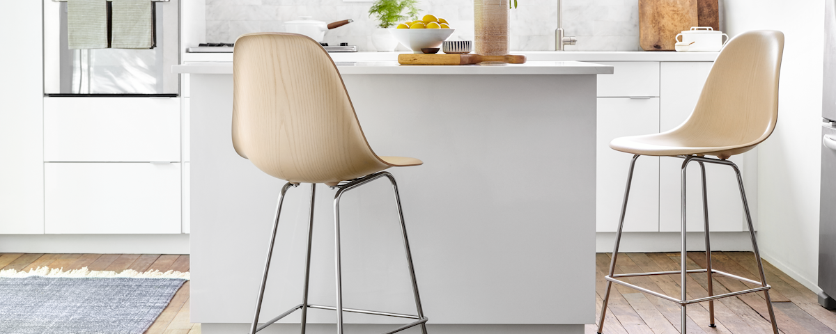 Eames Molded Plastic Stools at a kitchen island setting