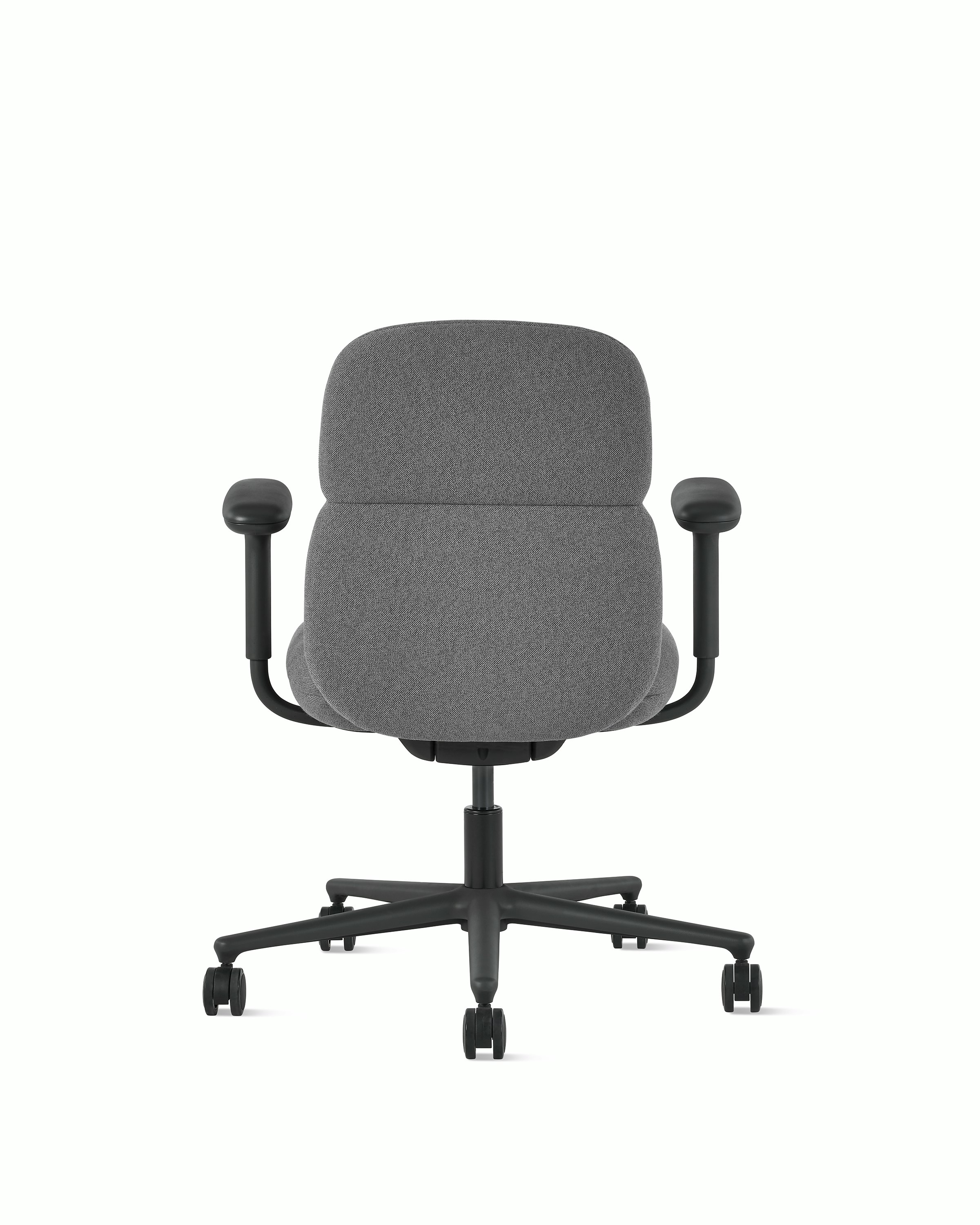 Rear view of a mid-back Asari chair by Herman Miller in dark grey with height adjustable arms.