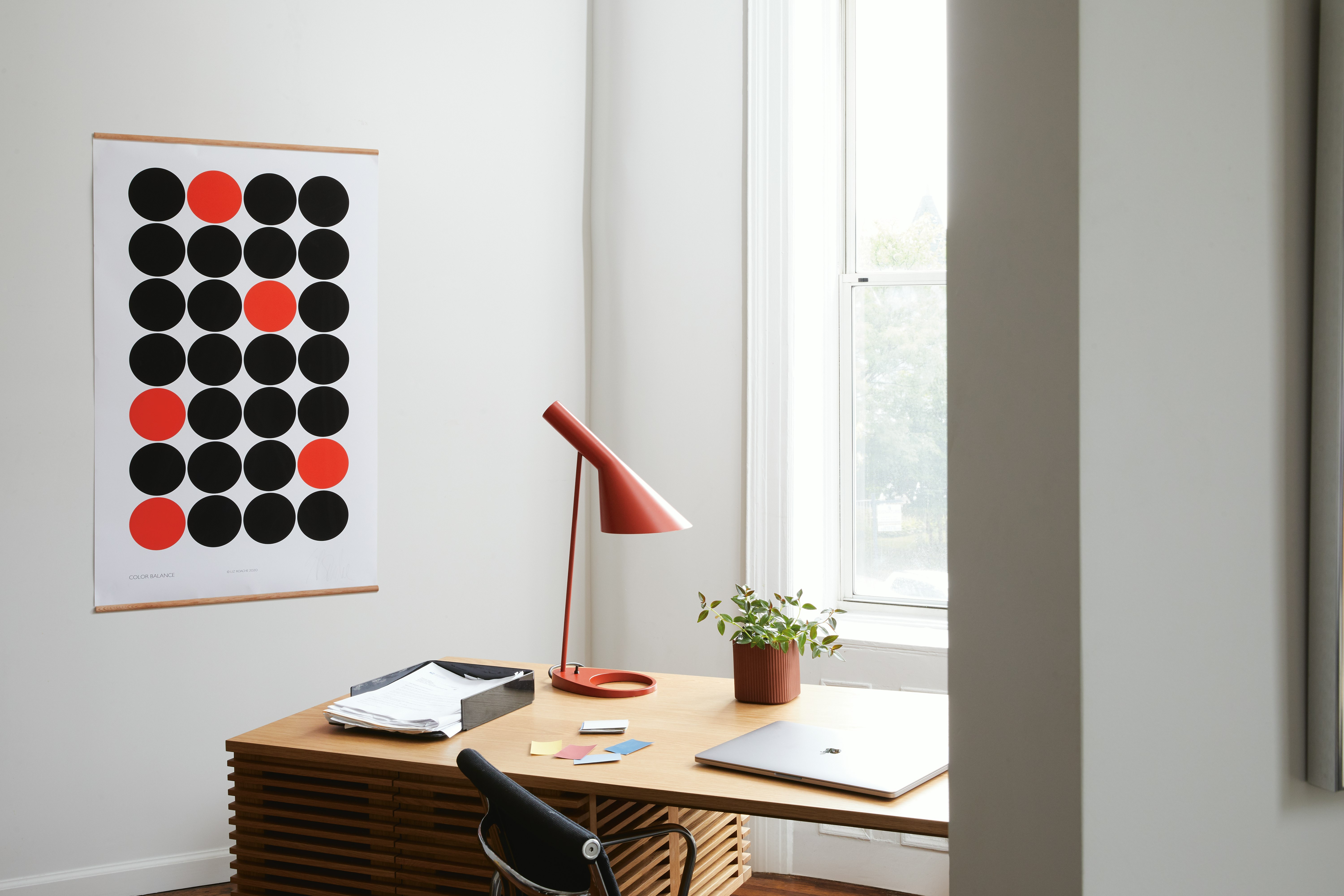AJ Table Lamp, Line Desk, Eames Aluminum Group Chair, and Color Balance Wall Print in a home office setting