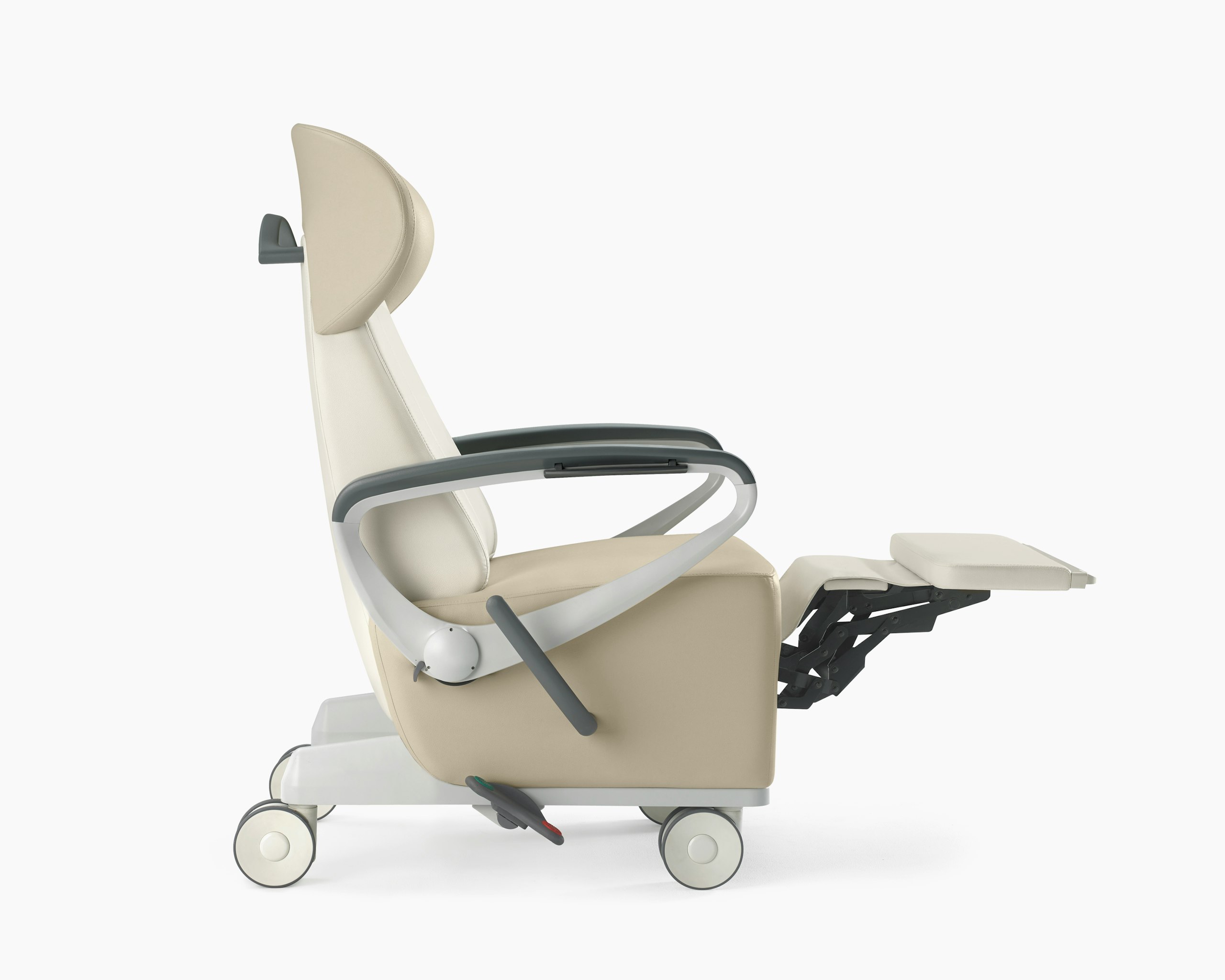 Nemschoff Ava Recliner with wingback in two beige upholsteries with the footrest extended.