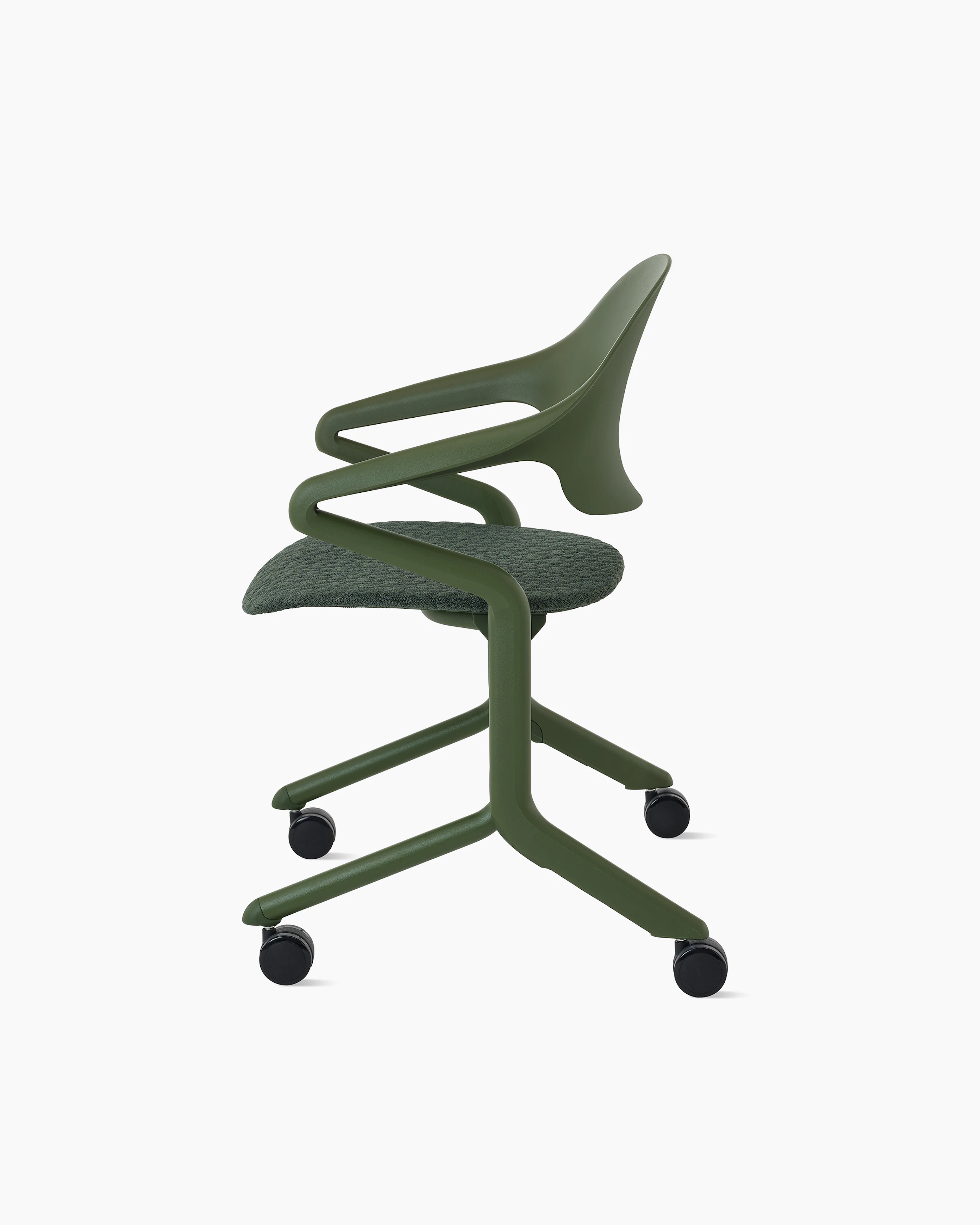 Profile view of a Fuld Nesting Chair in Olive.