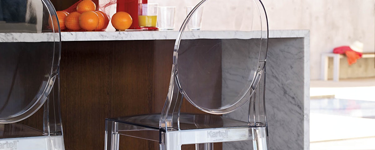 Pair of Kartell One More Stool counter stools at kitchen counter setting