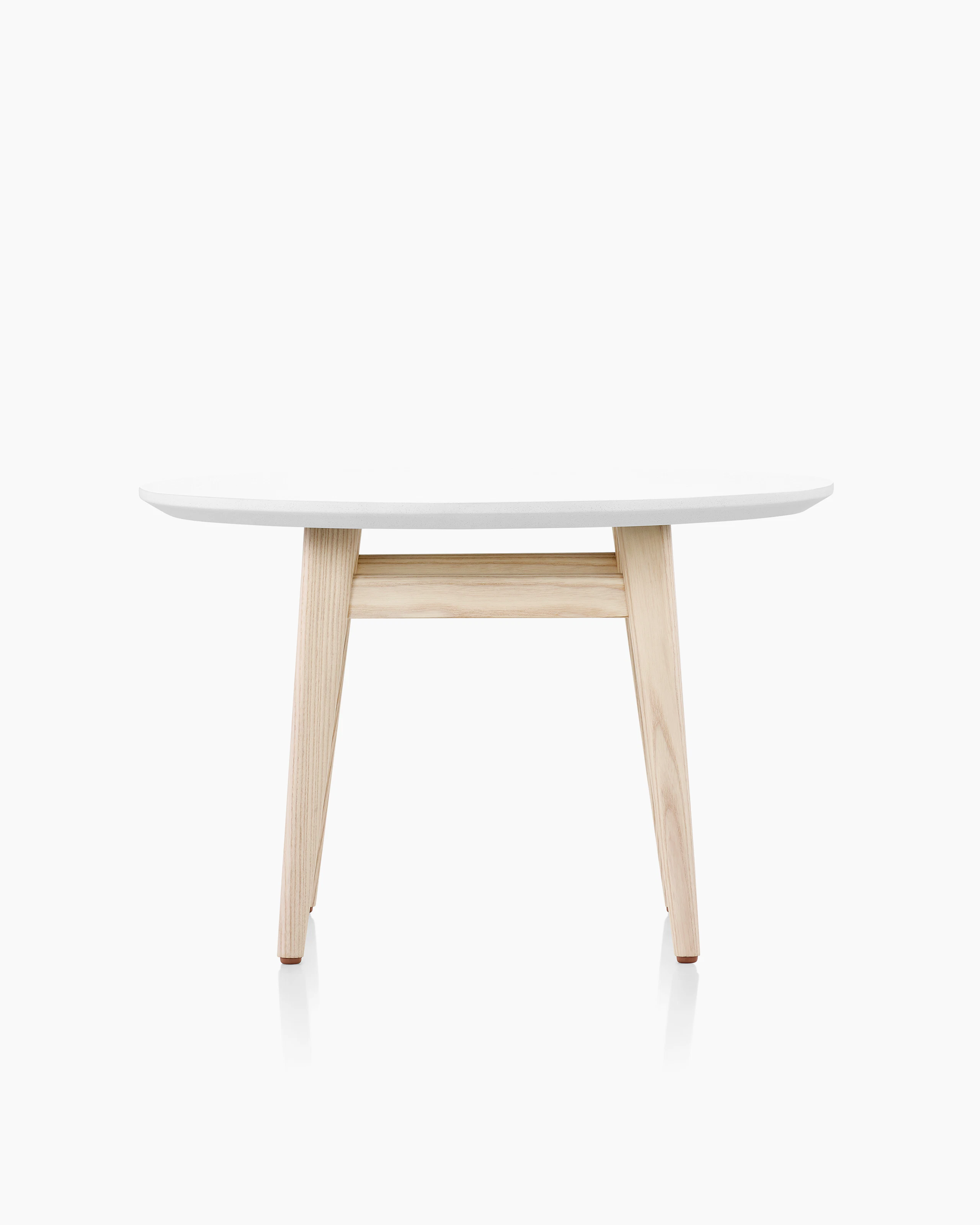 Palisade Occasional Table with wood legs and solid surface top on white sweep.
