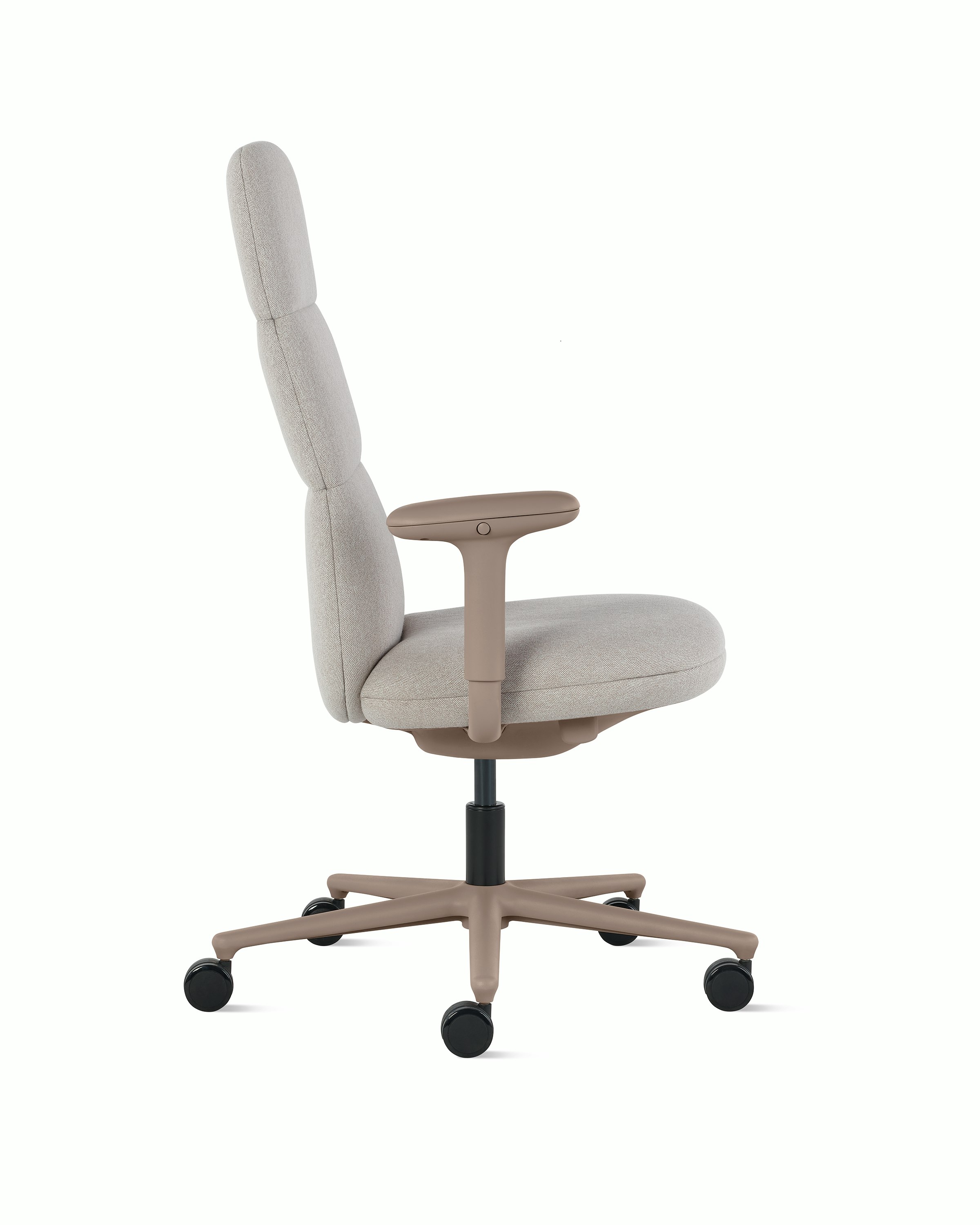 Side view of a high-back Asari chair by Herman Miller in light brown with height adjustable arms.