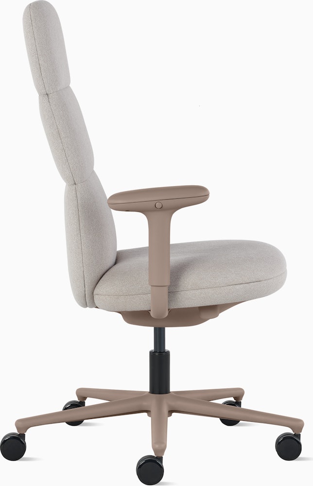 Side view of a high-back Asari chair by Herman Miller in light brown with height adjustable arms.