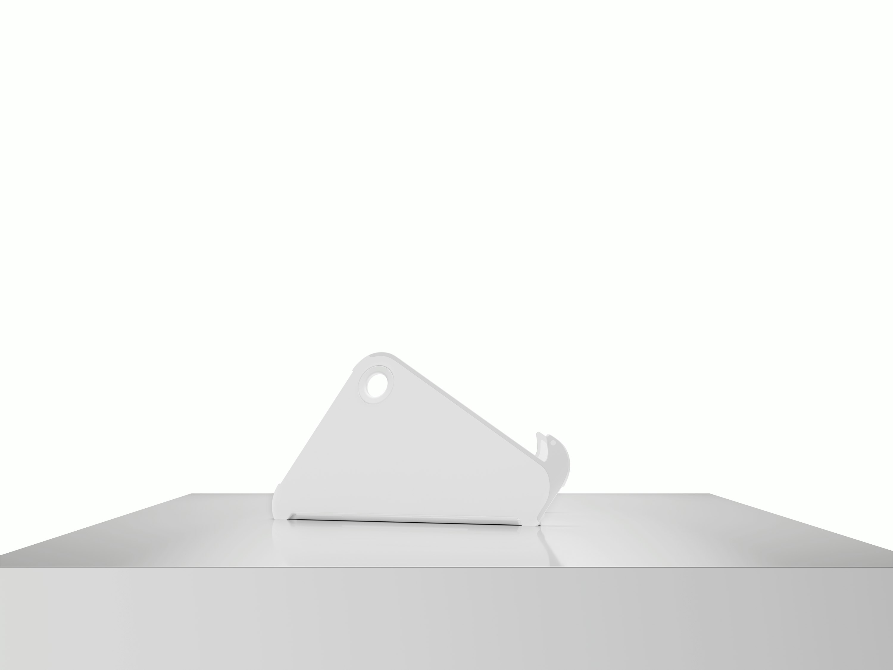 Side view of an open Oripura Laptop Stand on top of a worksurface.
