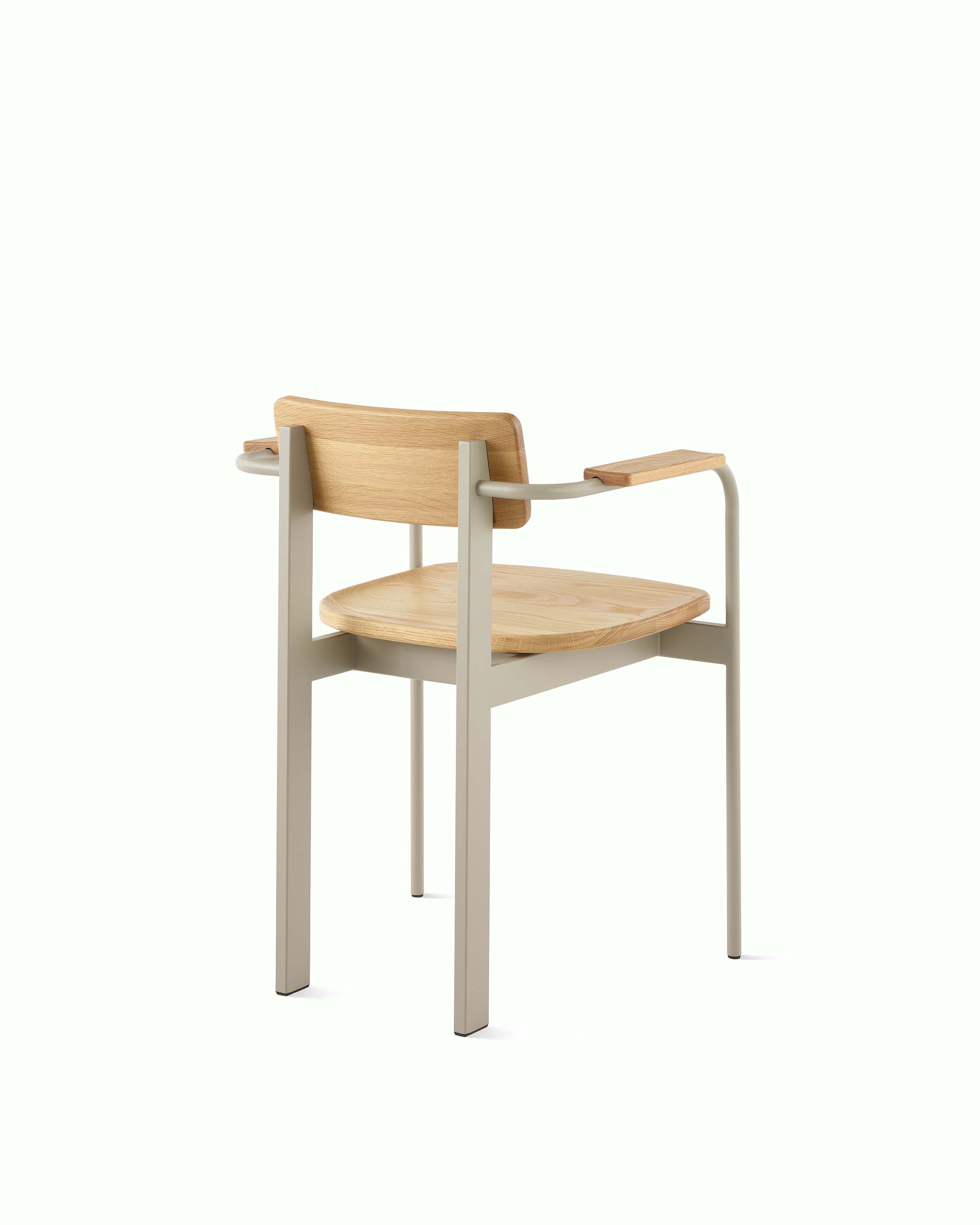 A Betwixt Chair with oak seat, backrest, arms and a grey frame. 