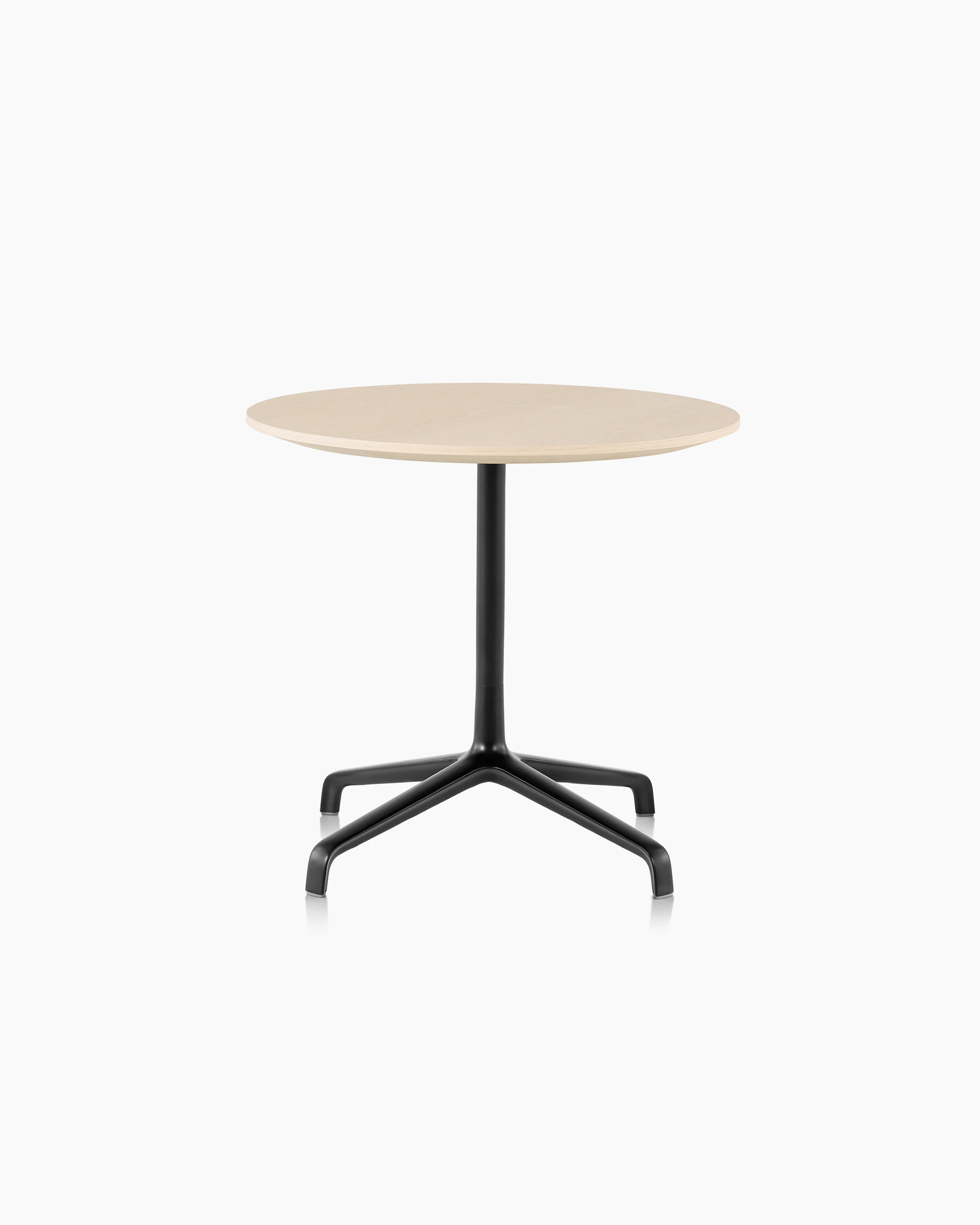 A Striad Table featuring a White Ash top.