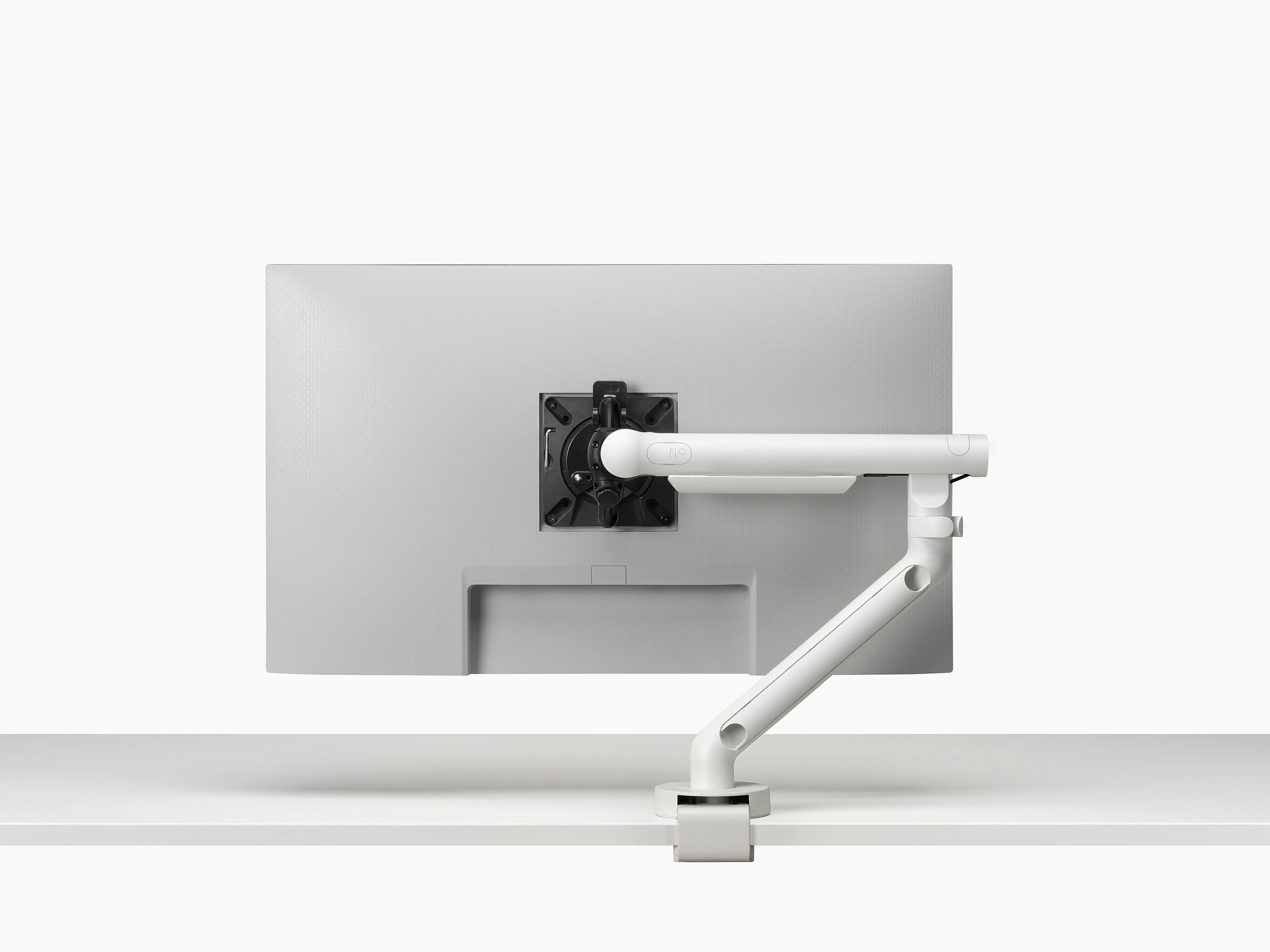 Flo monitor arm in white viewed from the back.