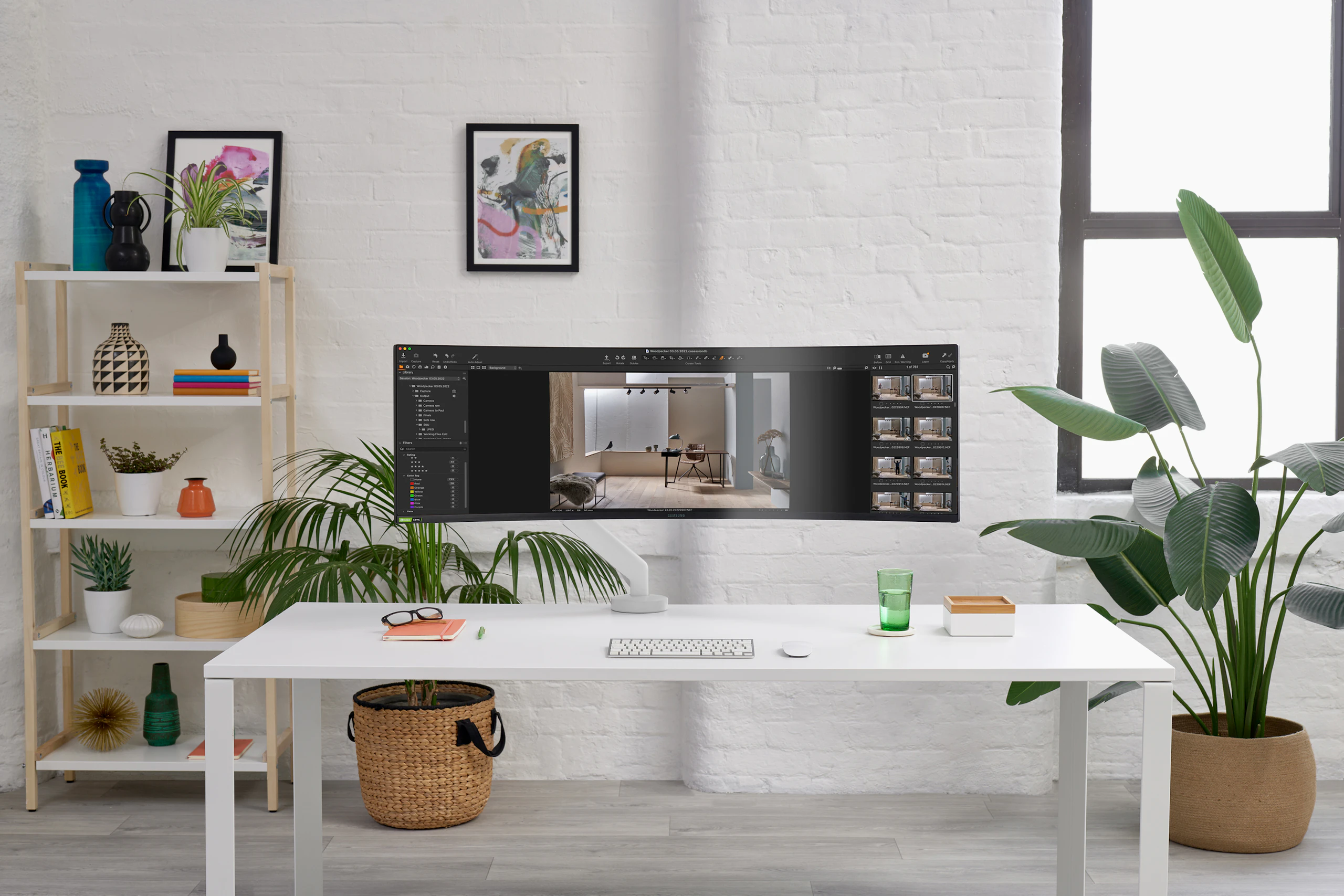 White Flo X monitor arm showing a 49'' screen, viewed from the front.