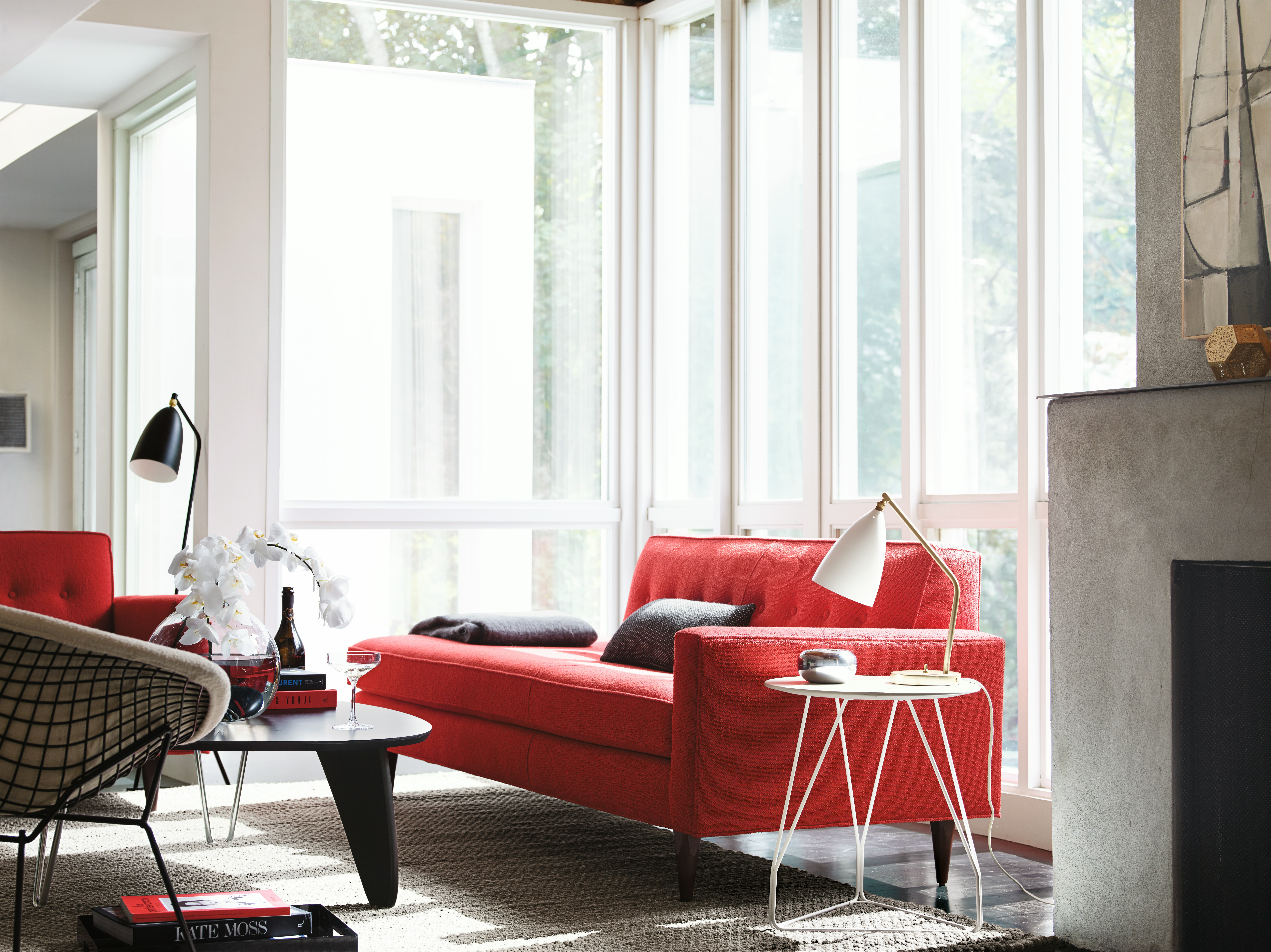 Grasshopper Table Lamp on a Polygon Wire Table in a living room setting