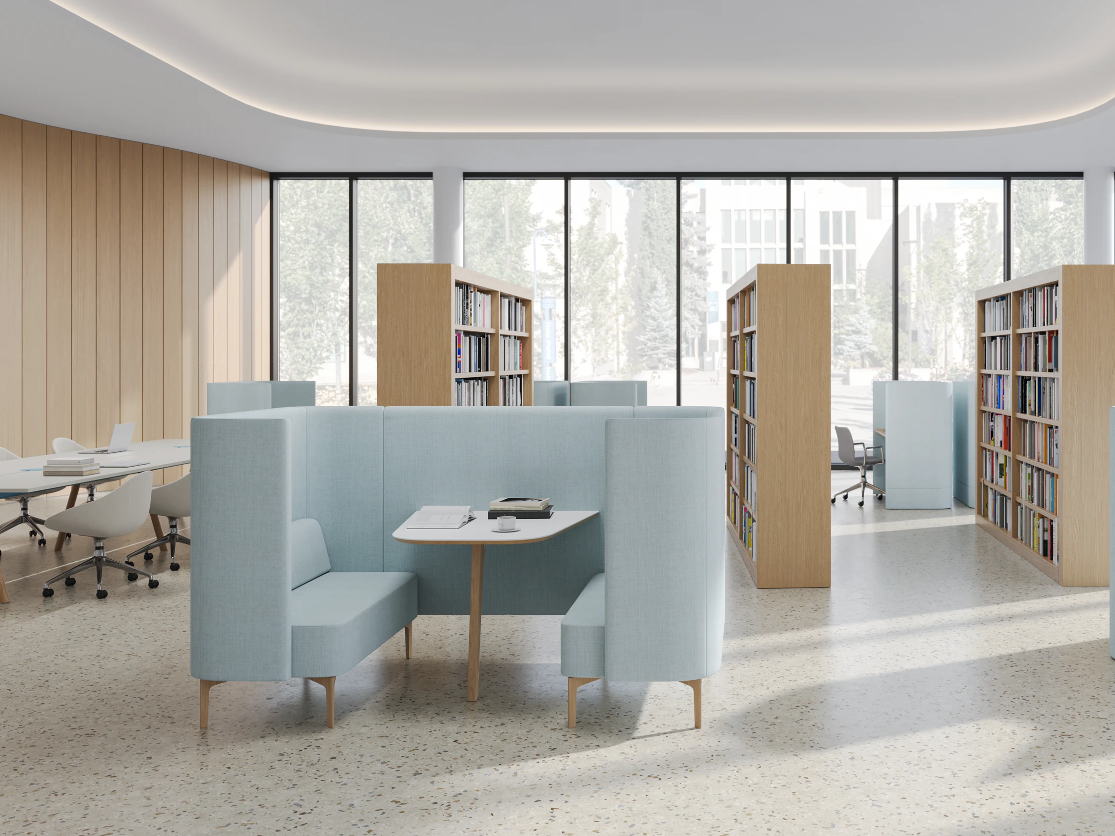 Higher Education library setting with Pullman Booth in the center and Pullman Chair pod to the right, both upholstered in Maharam Campana. A Morse Table with Always Chairs is off to the left.