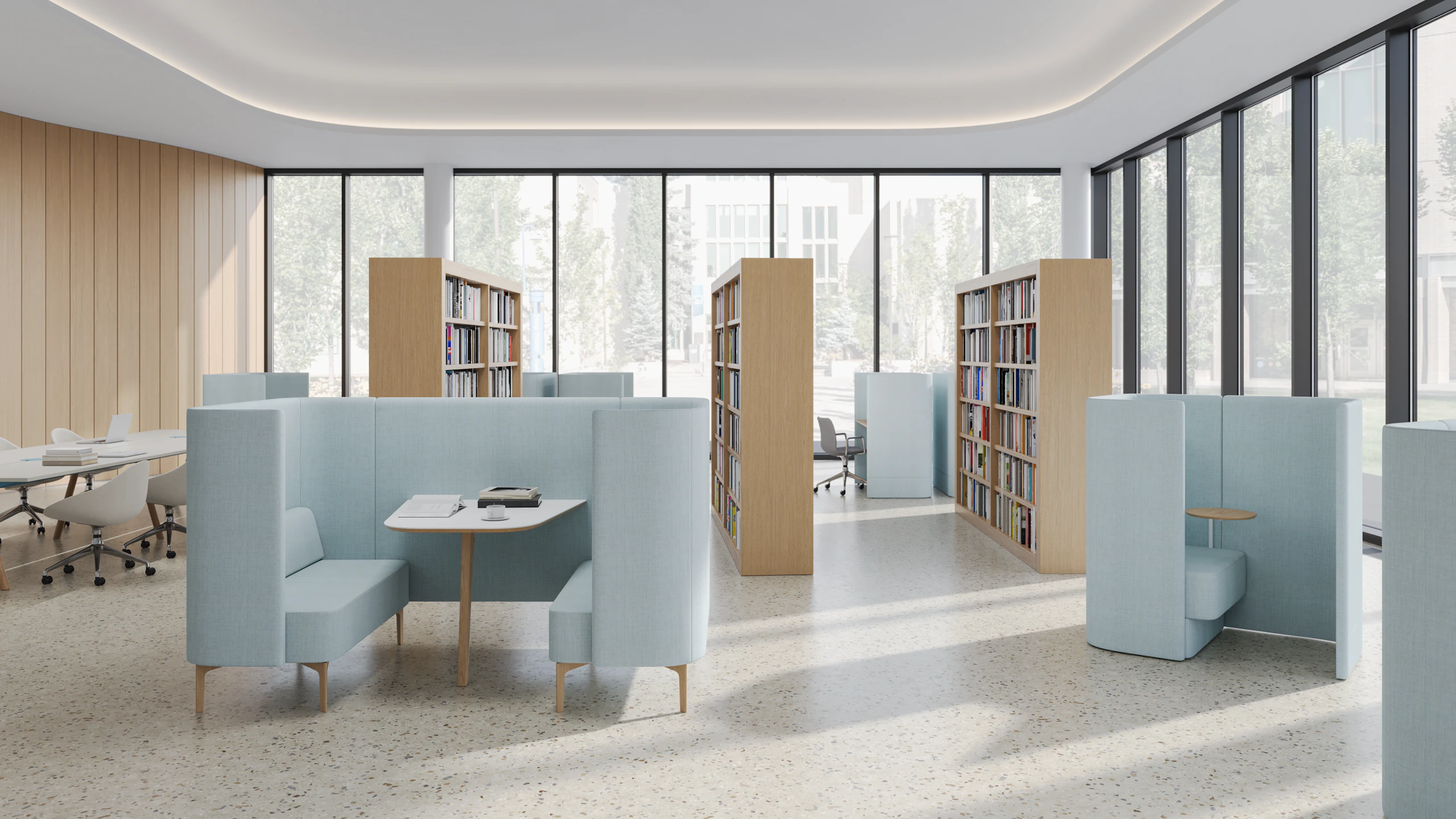 Higher Education library setting with Pullman Booth in the centre and Pullman Chair pod to the right, both upholstered in Maharam Campana. A Morse Table with Always Chairs is off to the left.