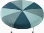 A Girard Color Wheel Ottoman upholstered in green fabrics, viewed from the top.