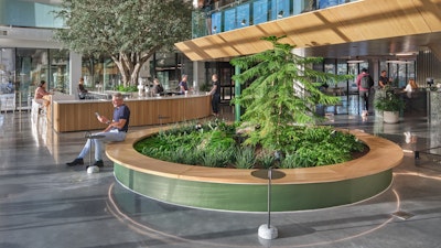 A brightly lit, interior view of the Ledger mixed-use office and retail space in Bentonville, Arkansas
