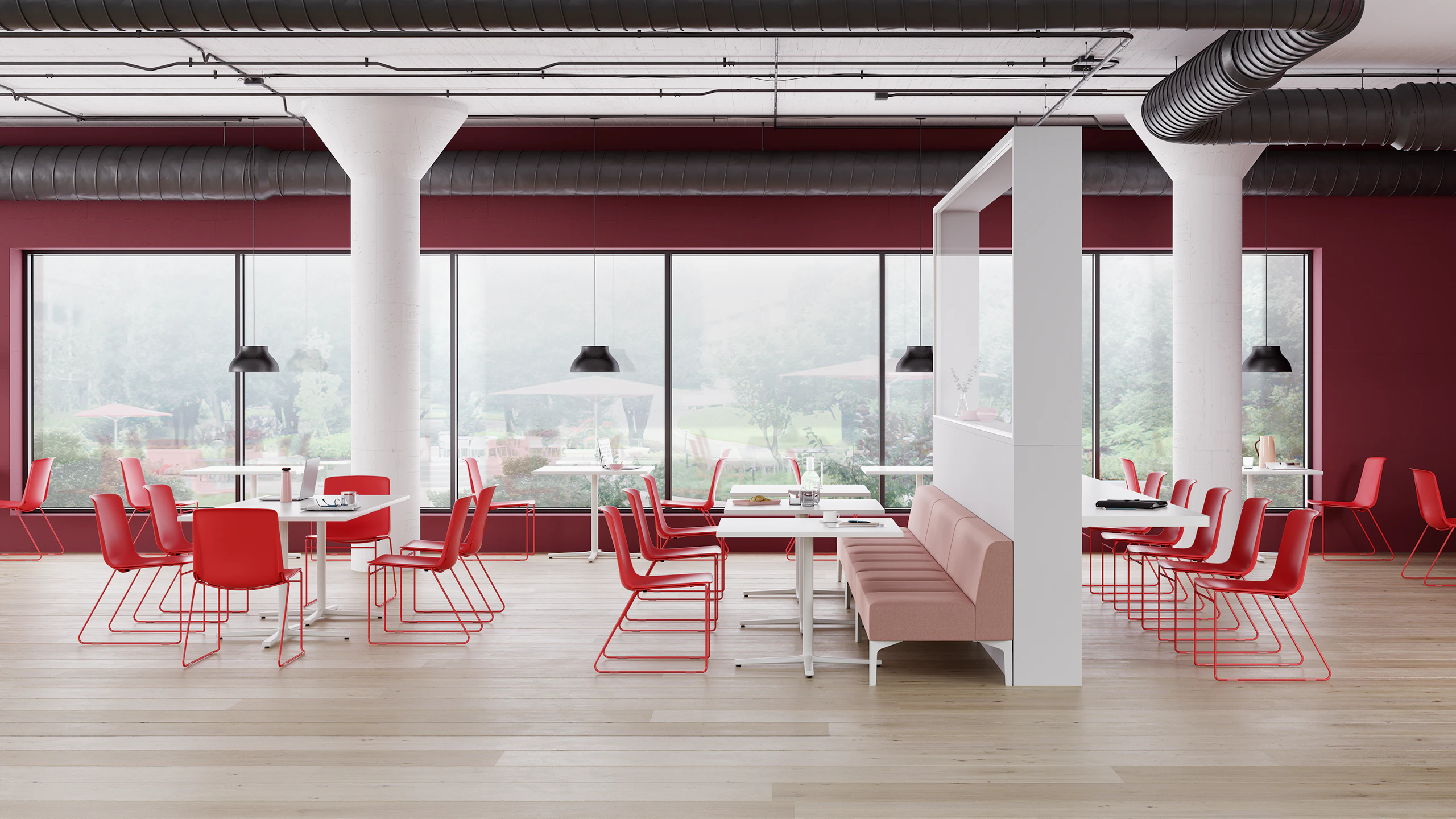 A Café space with red Pronta Stacking Chairs, white Everywhere Tables, and pink Hatch Modular Seating.