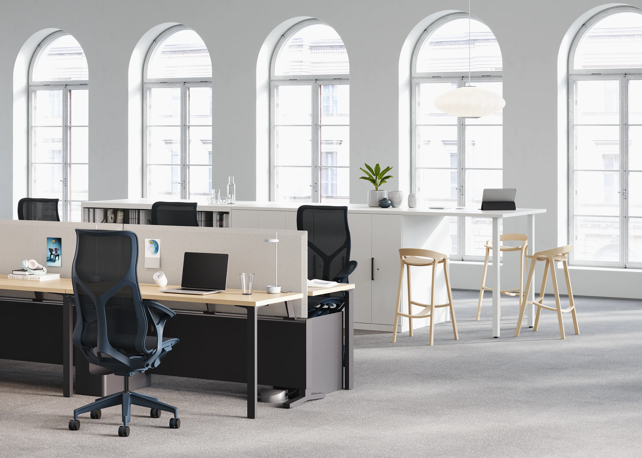 A Canvas Dock workstation, with four high-back Cosm chairs, is a source of power for a Logic Reach round system start.