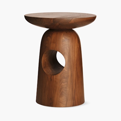A Hew Side Table in a walnut finish.