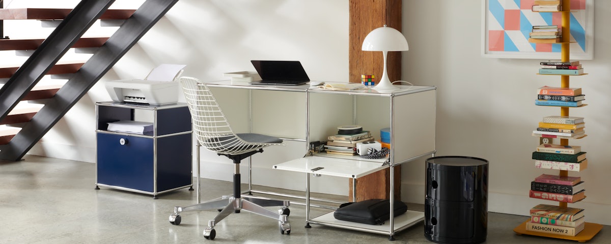 Story Bookcase, USM Haller Desk 1, and USM Haller P Bedside Table in a home office nook
