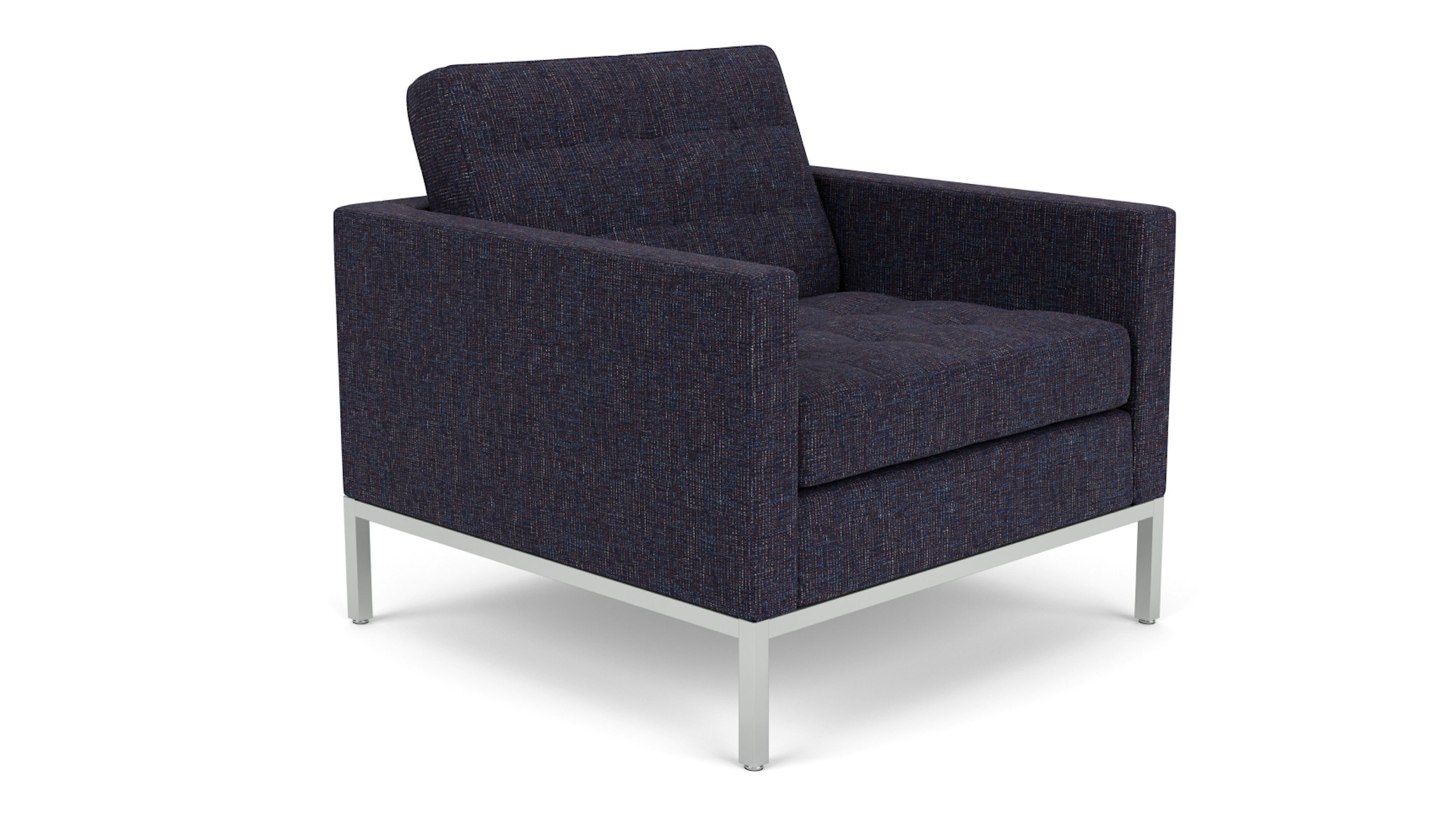 A 3/4 front view of a blue Florence Knoll Lounge Chair against a white background