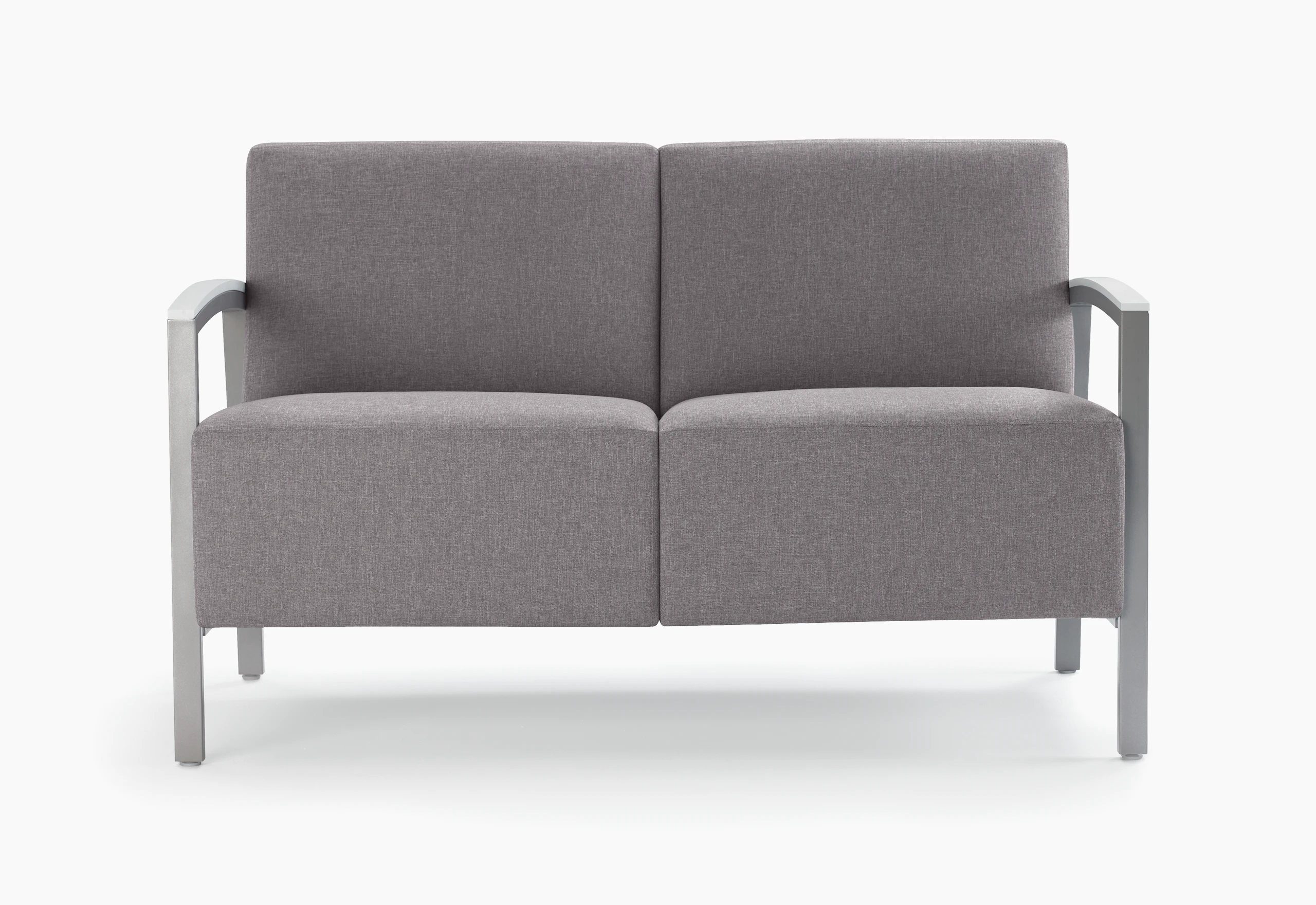 Front view of a gray Brava Modern Lounge Seating two-seat chair with solid surface arm caps.