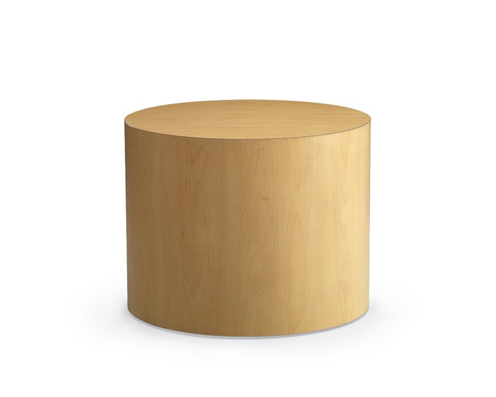 Cylinder table in a honey maple finish.