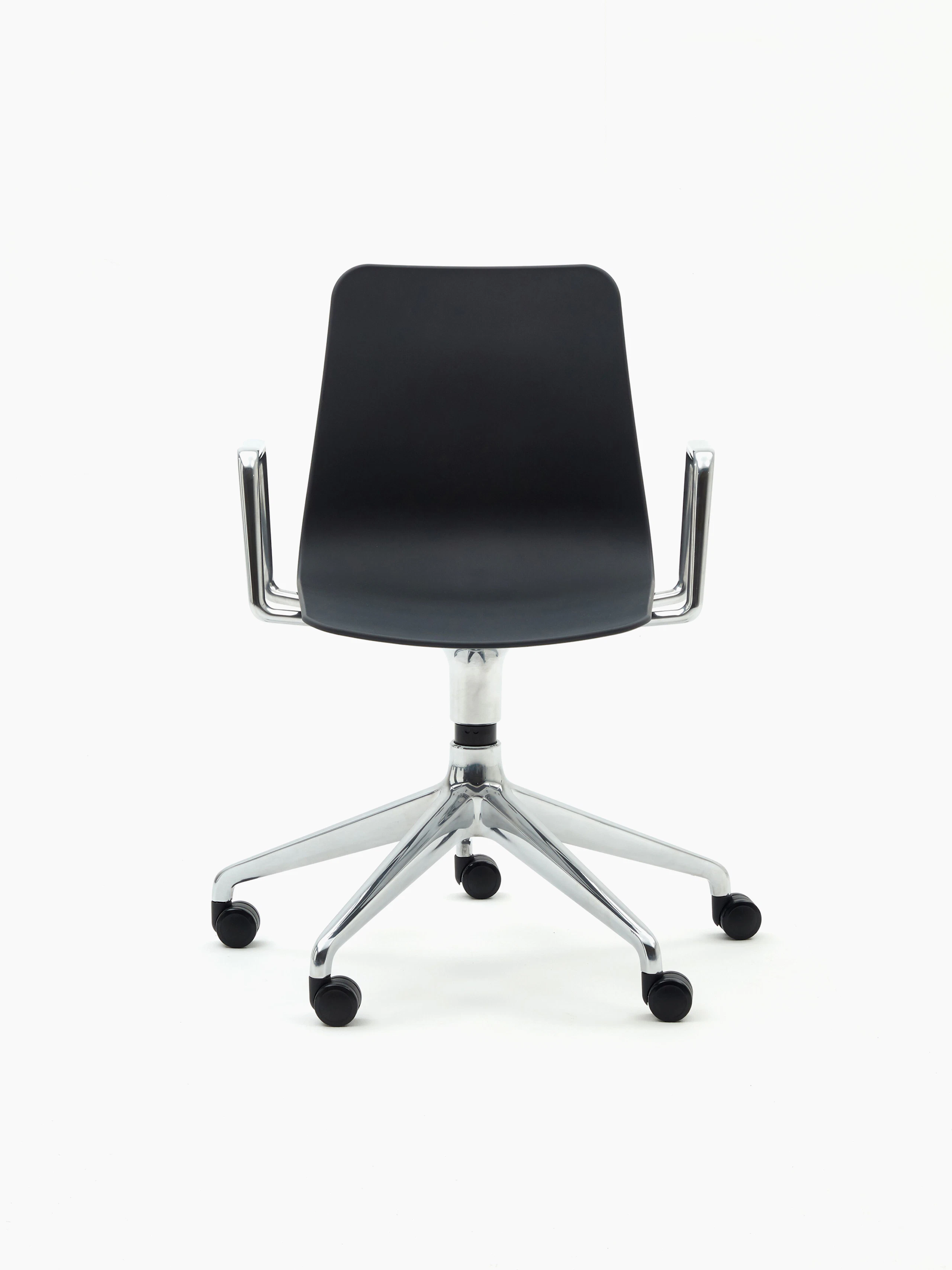 A black naughtone Polly Chair with a 5-star chrome base and armrest, viewed from the front.